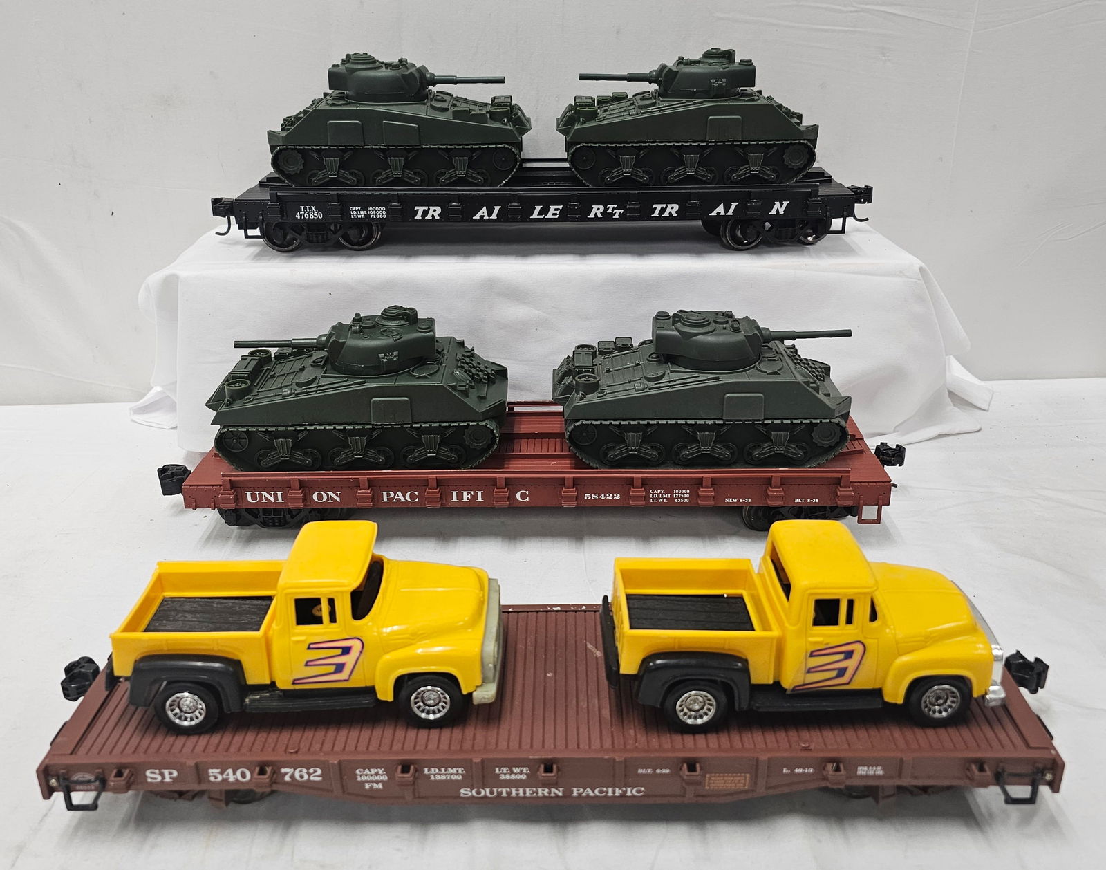 Charles Ro & Aristo-Craft Flat Car Lot W/ Tanks: Charles Ro & Aristo-Craft G-Scale Flat Car Lot W/ Tanks, C-7+. 1. (x2) Charles Ro Union Pacific & TTX Auto Carriers W/ Tanks, C-7+. 2. Aristo-Craft 540762 Southern Pacific Flatcar W/ Classic Yellow Tr