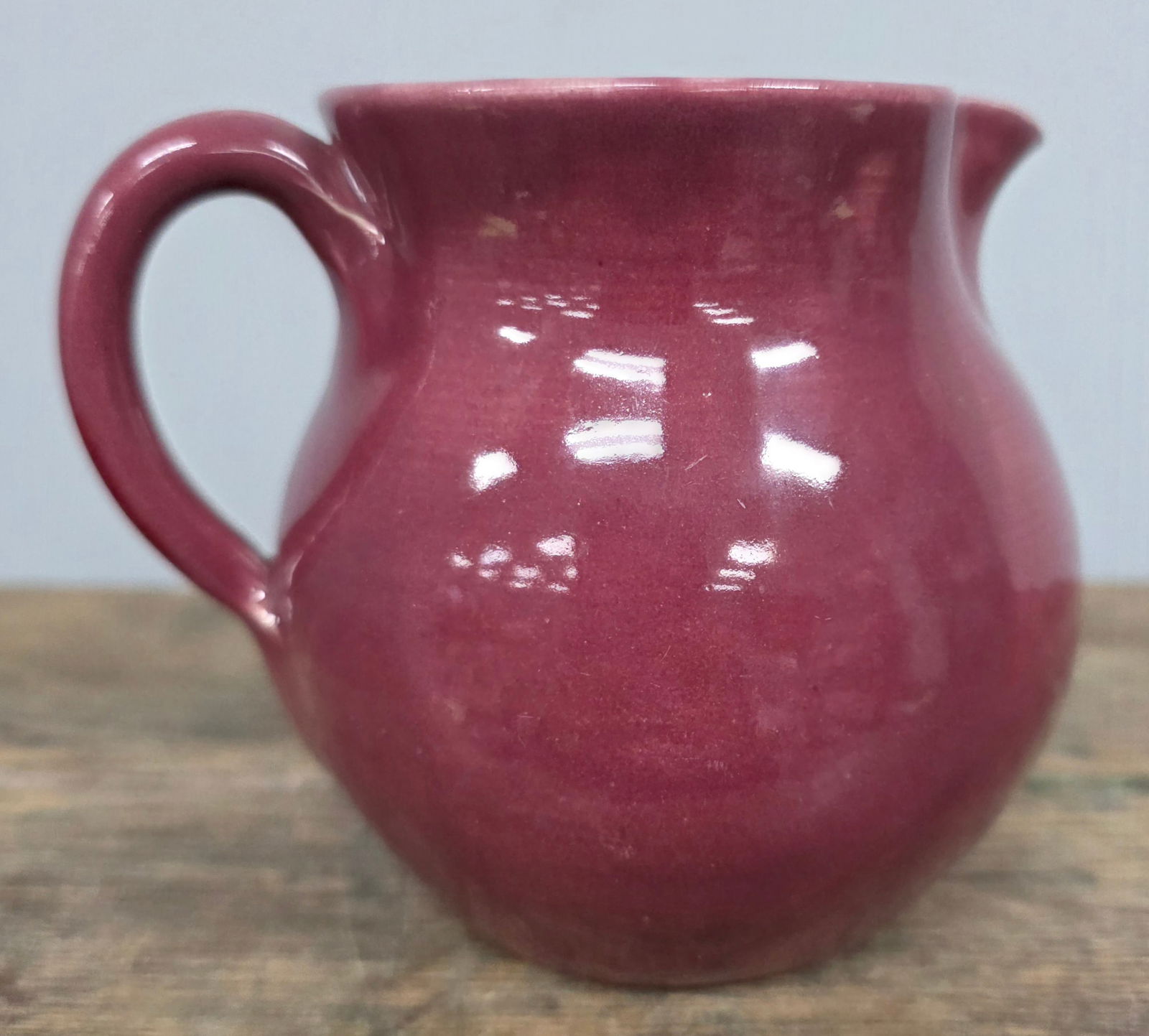 WJ "Bill" Gordy Pink Creamer Signed: WJ "Bill" Gordy Pink Creamer Sigend and in collector grade condtition. Standing 3 3/4" Tall