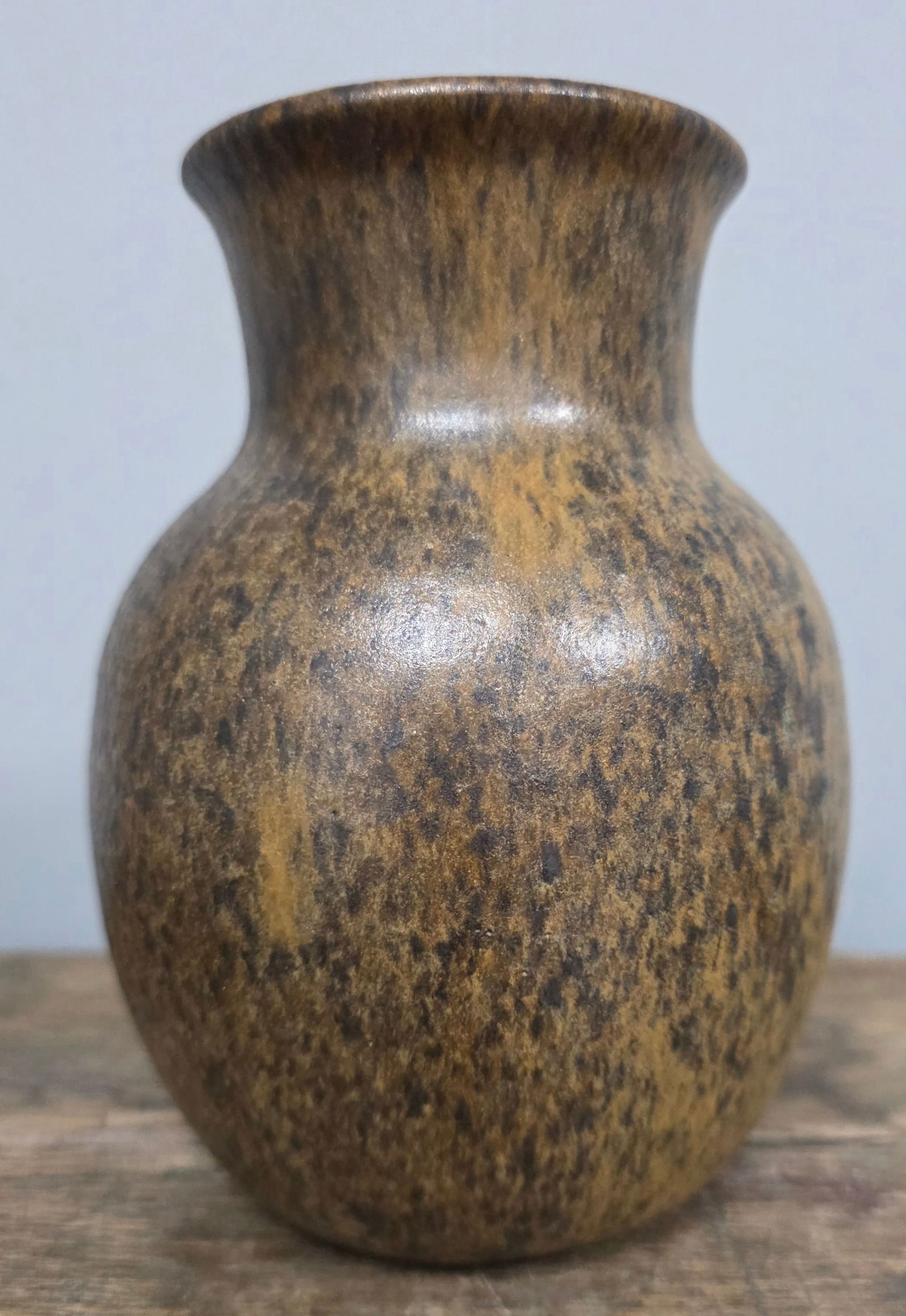 W J Gordy Small Vase: W J Gordy Small Vase. Mountain Gold glaze and signed on the bottom. Standing: 6 1/2" tall.
