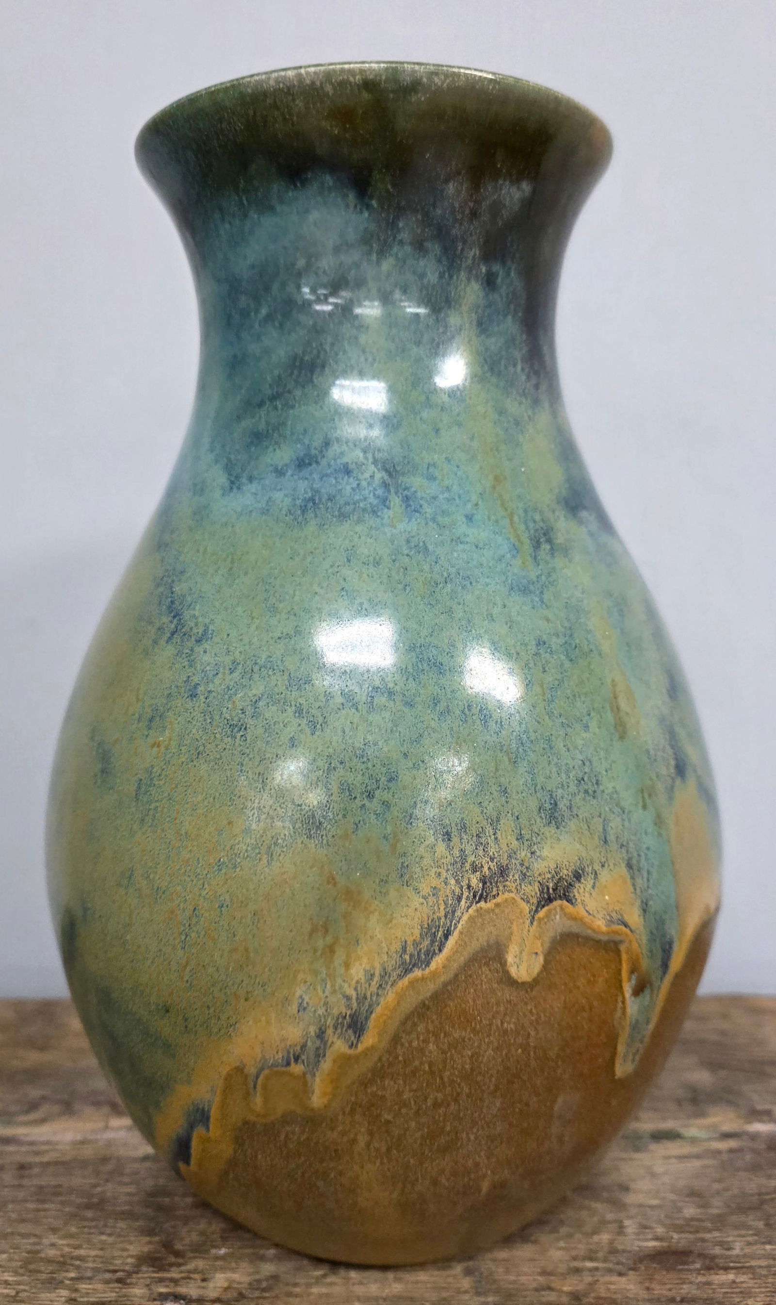 Stunning W J Gordy Flower Vase Double Stamped: Absolutely Stunning W J Gordy Double Stamped Flower Vase. Beautiful blue-green and Mountain Gold glaze. Will look beautiful on your mantle or shelf. Double stamped Gordy on the bottom. Standing: 12" t
