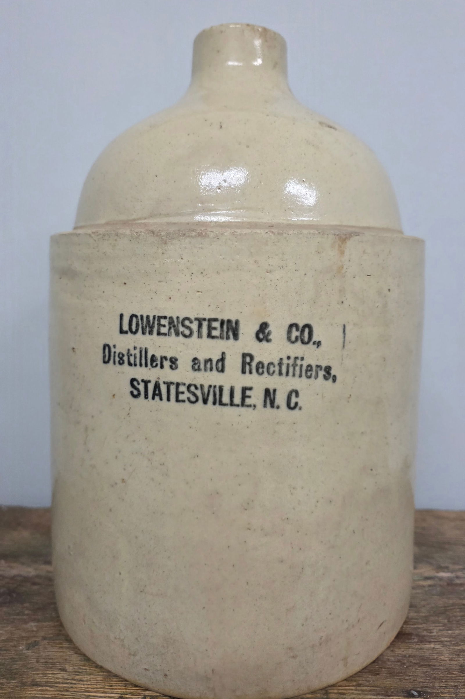 Lowenstein & Co. Distillers Statesville, NC Jug: Rare 2 1/2 Gallon Lowenstein & Co. Distillers & Rectifiers Statesville, North Carolina Jug. Bristol glazed body with black stencil. Condition is collector grade with a few minor small chips. No cracks