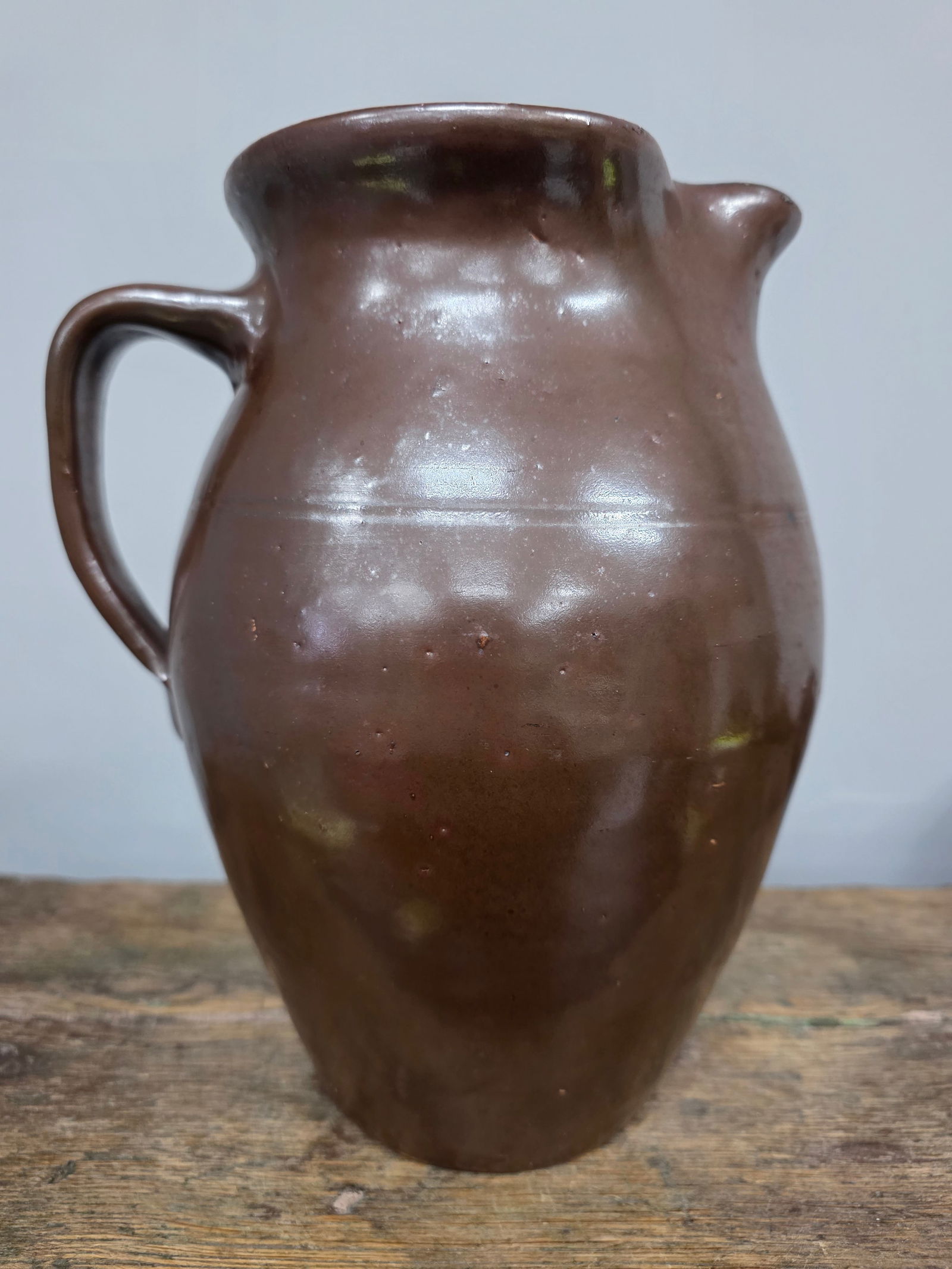 Signed "JNL" Jasper Newton Long Peach Co. Pitcher: Rare and Signed "JNL" Jasper Newton Long (1880-1967) Peach Co. Pitcher. These are some of Georgia most sought after Long pieces. This is a slip glazed pitcher with a strong stamp on handle. Collector