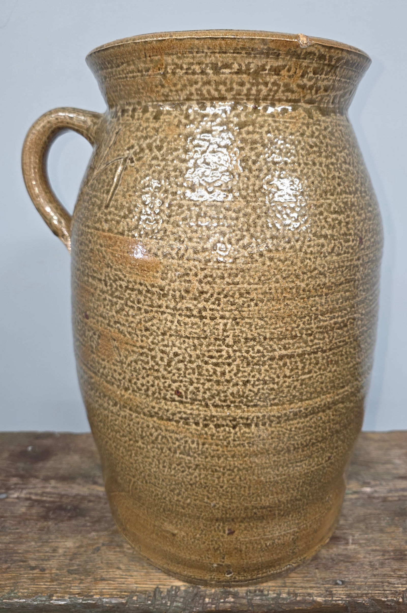 Texas 4gal Alkaline Glazed Churn: Outstanding Texas Four Gallon Alkaline Glazed Churn. Beautiful example out of Texas with a heavy wood fired ash alkaline glaze that has very nice eye appeal in heavy orange peel textured glaze. This