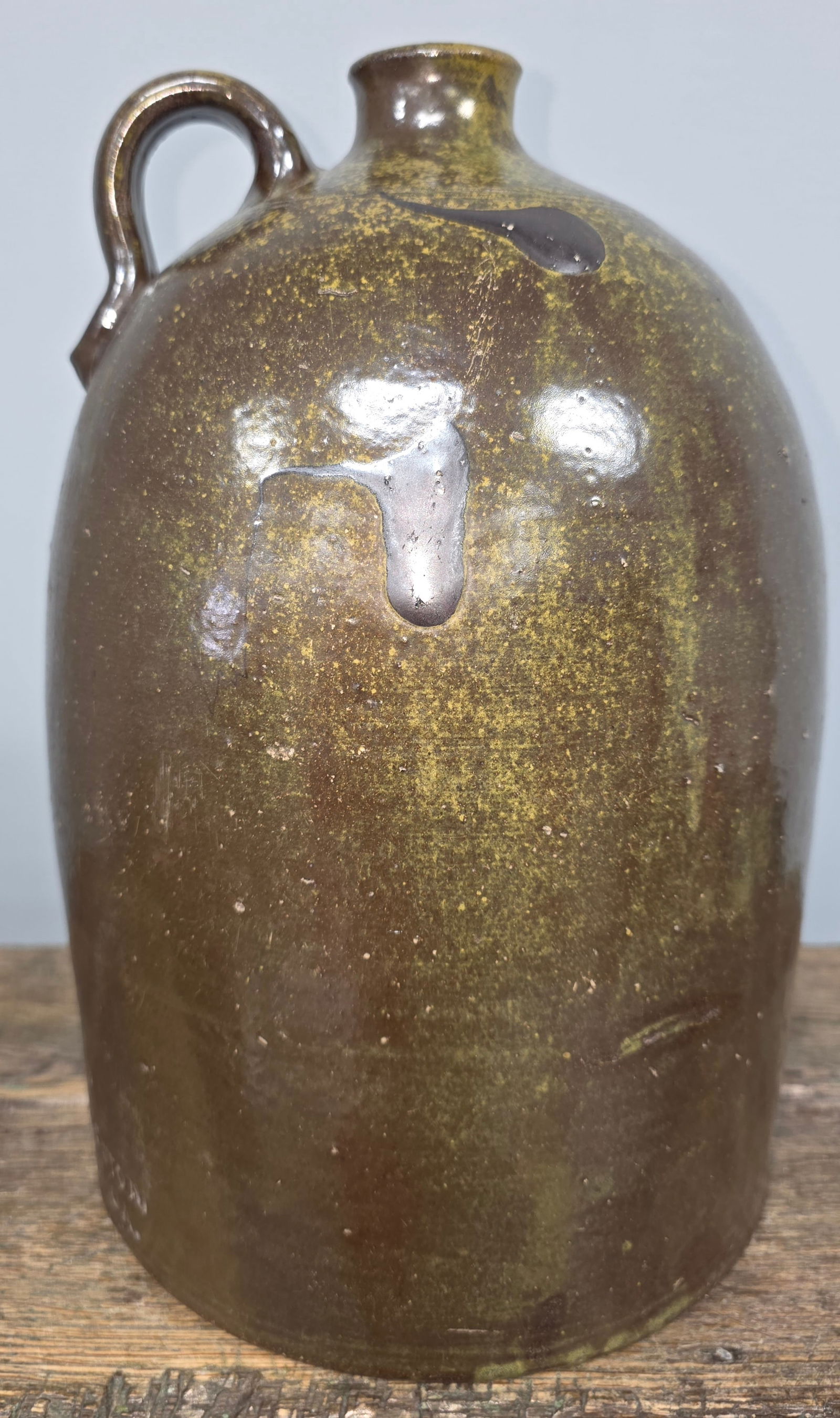 Signed W R Addington 2 Gallon Jug: Signed W R Addington 2 Gallon Jug, from 1880-1886 time period and has an outstanding salt over slip glaze. Collector grade condition with no damage, cracks, or repairs. T his is a premium collector