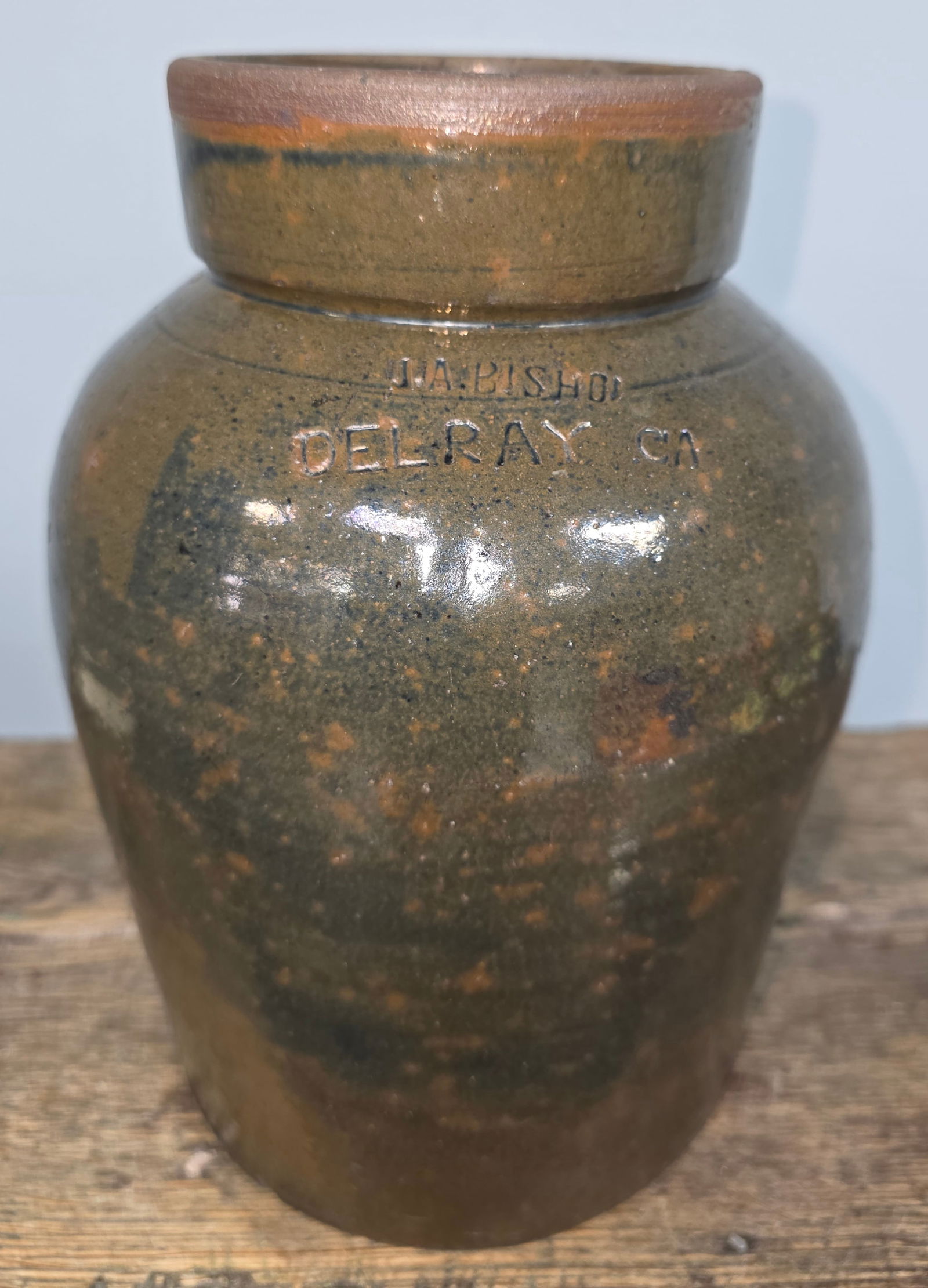 Signed JA Bishop Delray, Ga. Lap Churn: 1890s Signed J.A. Bishop Delray, Georgia Lap Churn with a strong stamp on the shoulder. Albany slip glaze. Collector grade condition with two insignificant glaze flakes. No chips, cracks or repairs. S