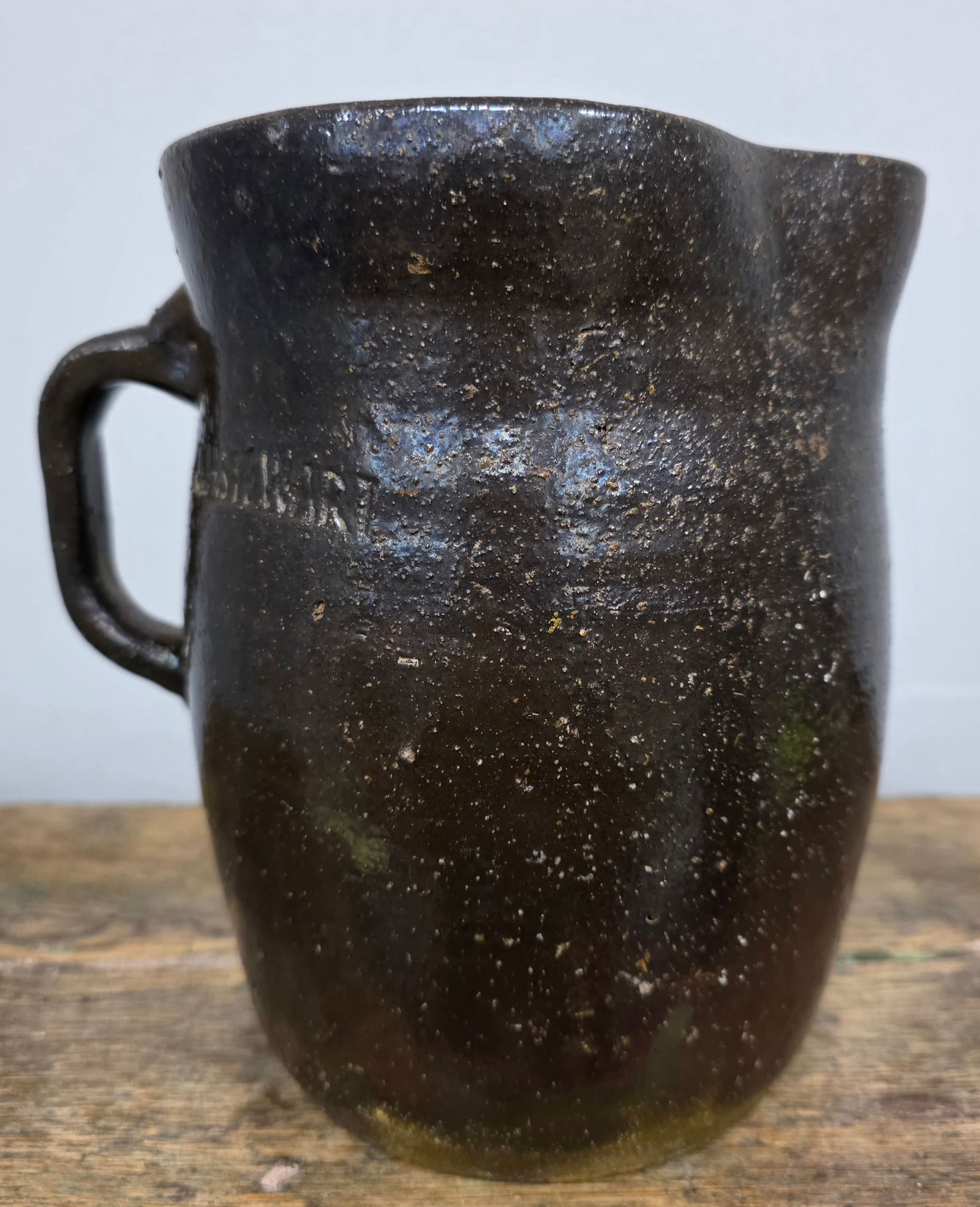Rare Signed JH Stewart Pitcher: Rare Signed "JH Stewart" John Henry Stewart (1878-1953) Pitcher with a strong stamp. Great example out fo Meansville, Georgia with a mature slip glaze. He also potter with JO Brown in Jugtown. This ex