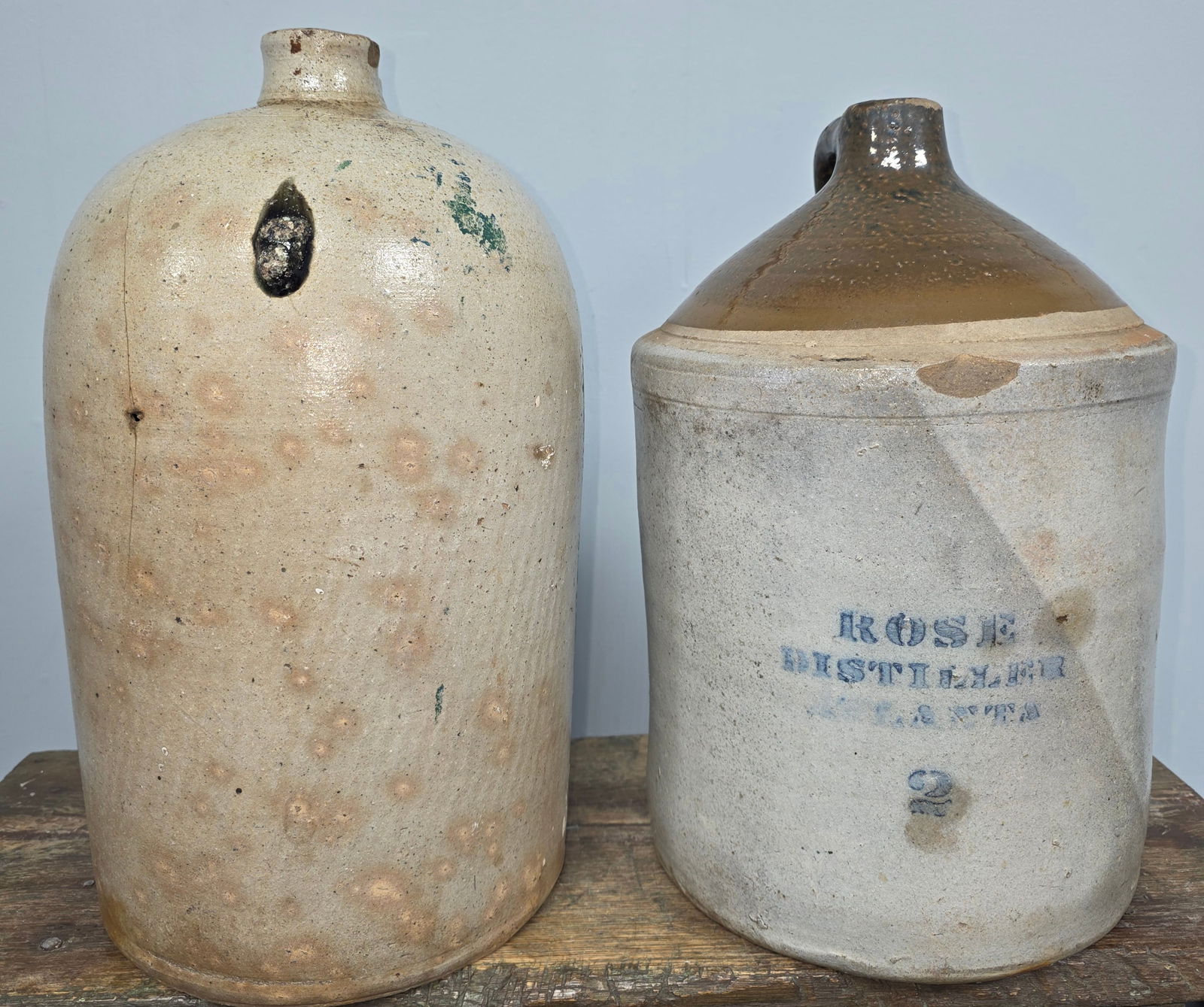 2 Gal R M Rose and C S Kline Signed Jug Lot of 2: 2 Gal R M Rose and C S Kline Signed Jug Lot of 2. 1. Charles Kline (1854-1917) 2 Gallon Salt Glaze Jug from 1880's with strong stamp on the shoulder. Has one small chip in the lip and firing lines in