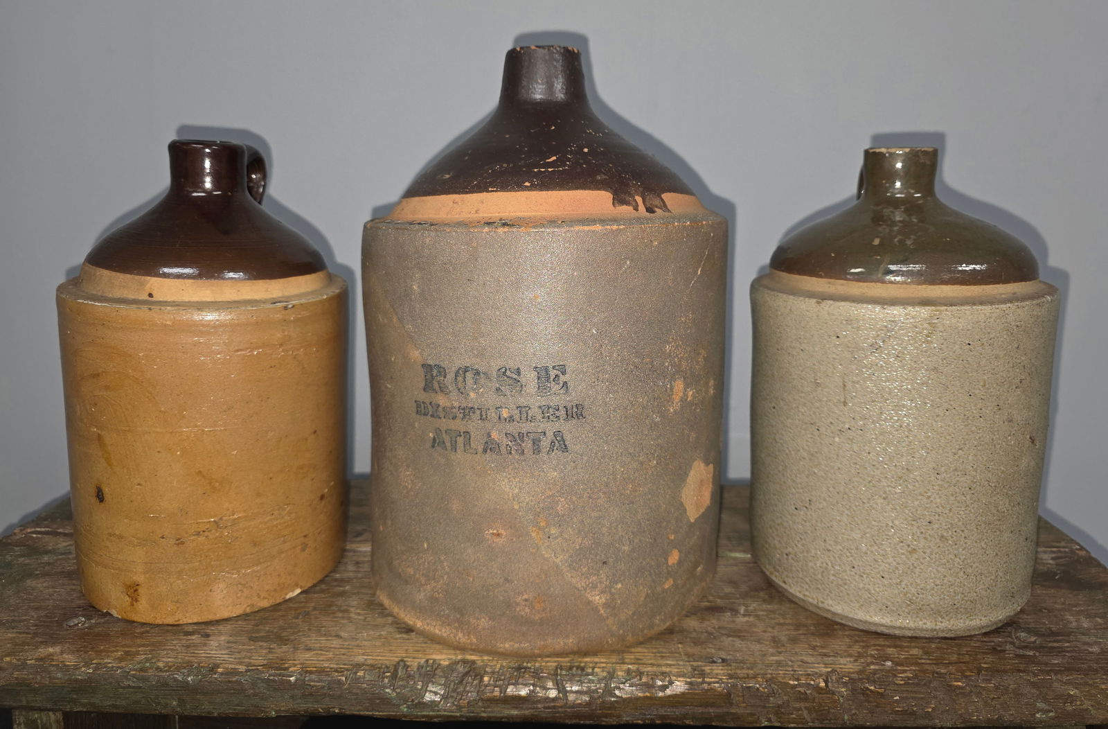 R.M. Rose Distiller Co. Stencil Jug & 2 Unmarked: R.M. Rose Distiller Atlanta Advertising Stencil Jug & 2 Unmarked Jugs 1-Rose Distiller Atlanta Advertising Stencil Jug, dark salt-glaze over terracotta with a dark chocolate brown top. Small glaze chi