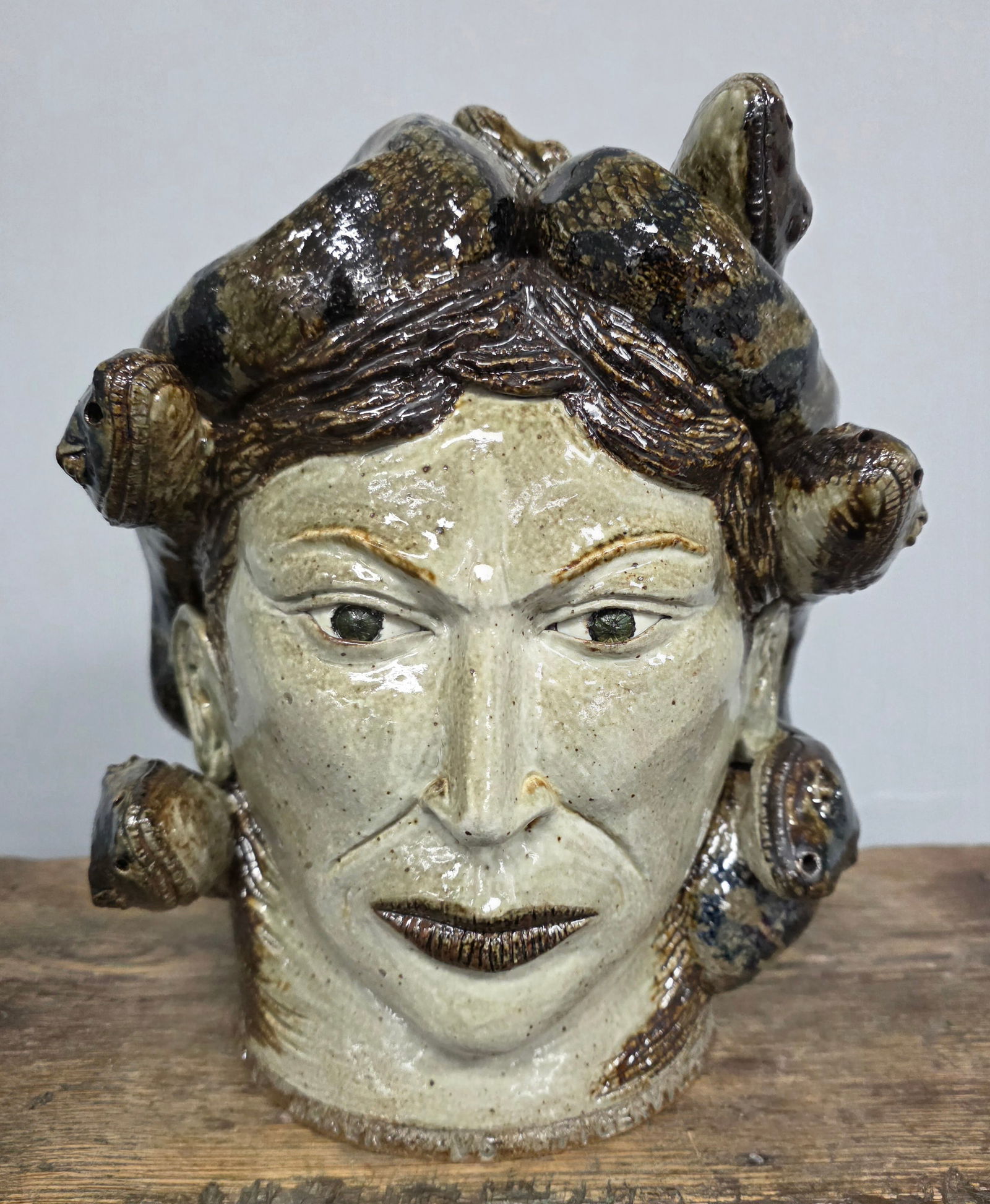 MIchel Bayne "Medusa" Face Figural: Outstanding Michel Bayne "Medusa" Face Figural that has amazing detail and eye appeal. This is an amazing example of Southern Folk Pottery. Standing: 10 1/4" Tall