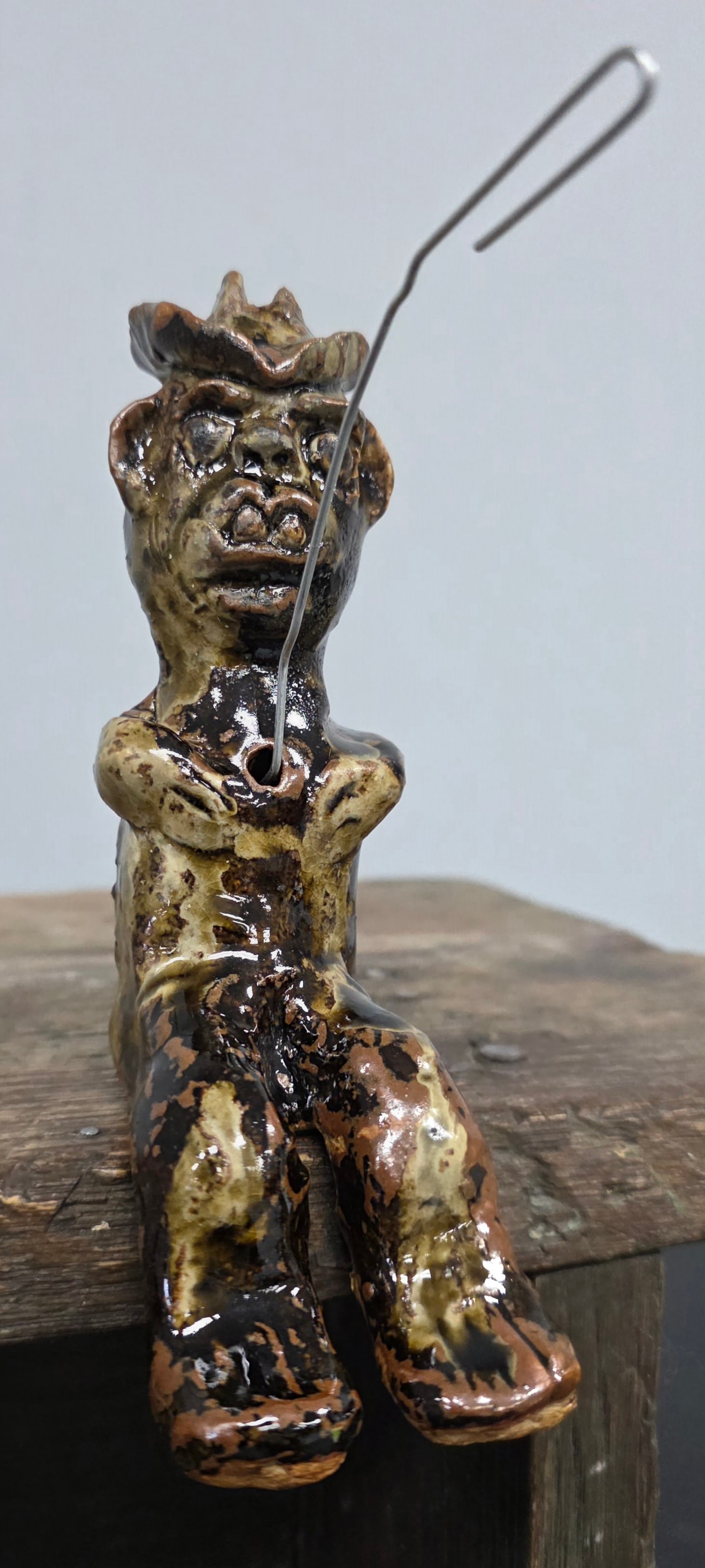 Marie Rogers Little Boy Fishing Pottery Figural: Marie Rogers Little Boy Fishing Southern Folk Pottery Figural, signed and in collector grade condition. Paper Clip is shown for small twig or branch for line and bobber. No damage. Standing: 4 3/4" Ta