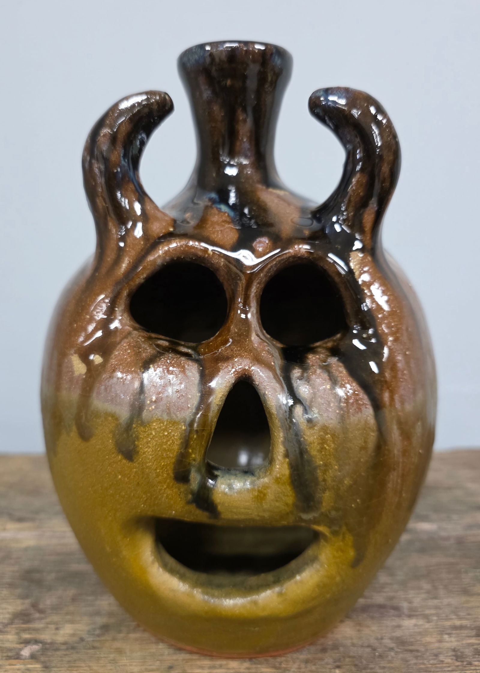 Mike Williamson Devil Pumpkin Face Jug: Alabama Folk Potter Mike Williamson Devil Pumpkin Face Jug, no damage or repairs. Signed on base. Standing: 8 3/8" Tall