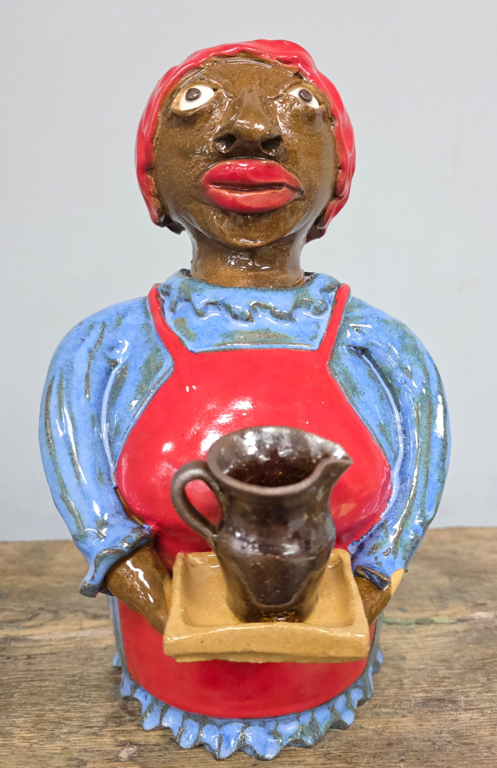 Rare Marvin Bailey Mammy Folk Pottery Figural: Rare Marvin Bailey Mammy Folk Pottery Figural with vibrant colors and details. Has a kiln shearing on the wrist and was done suring the firing (see photos). No other condition issues & no repairs.