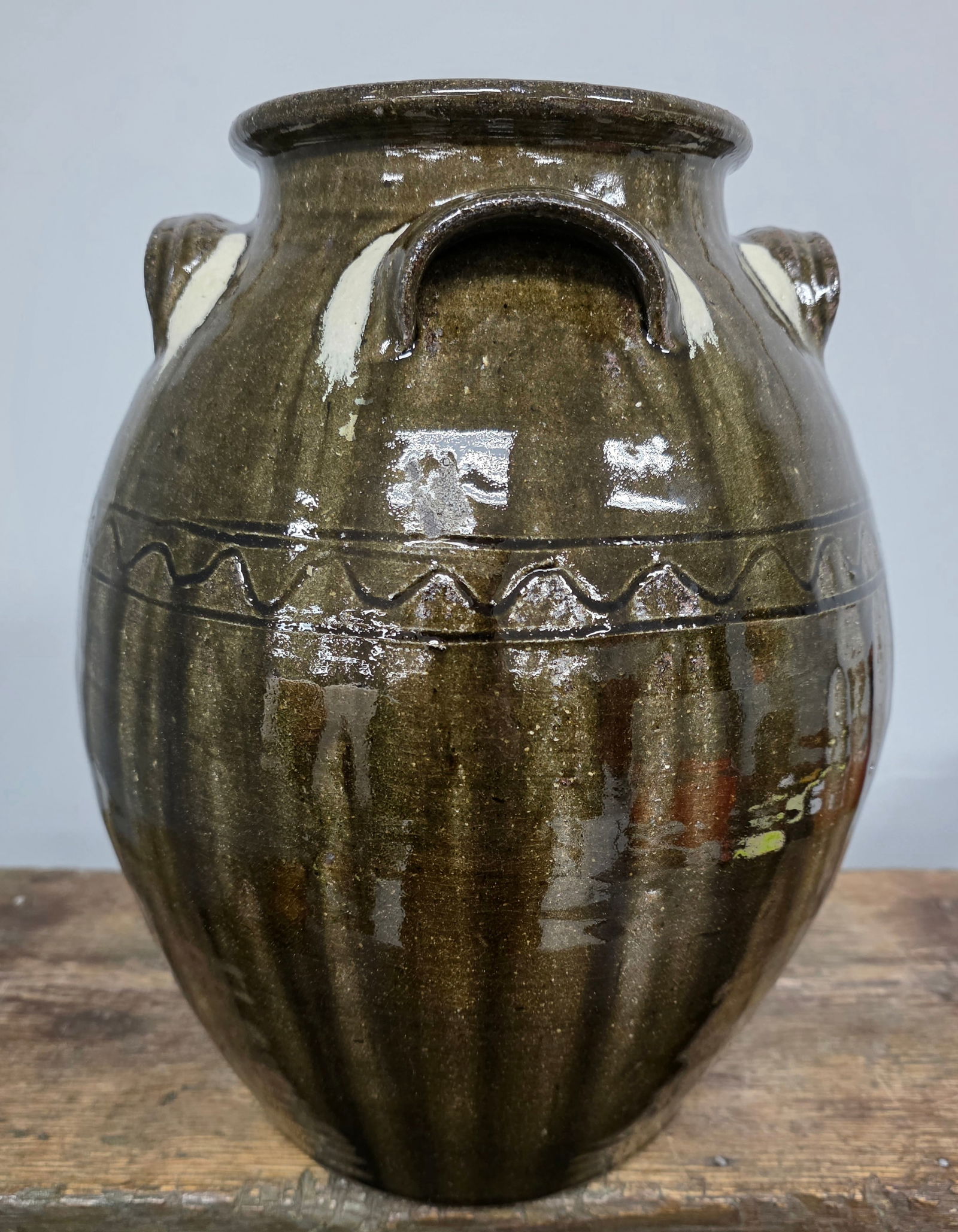 Clint Alderman 4 Handeled 2 Gallon Jar W/ Runs: Clint Alderman 4 Handeled 2 Gallon Jar With Milk Glass Runs. Signed and in collector grade condition, no damage or repairs. Standing: 13" Tall