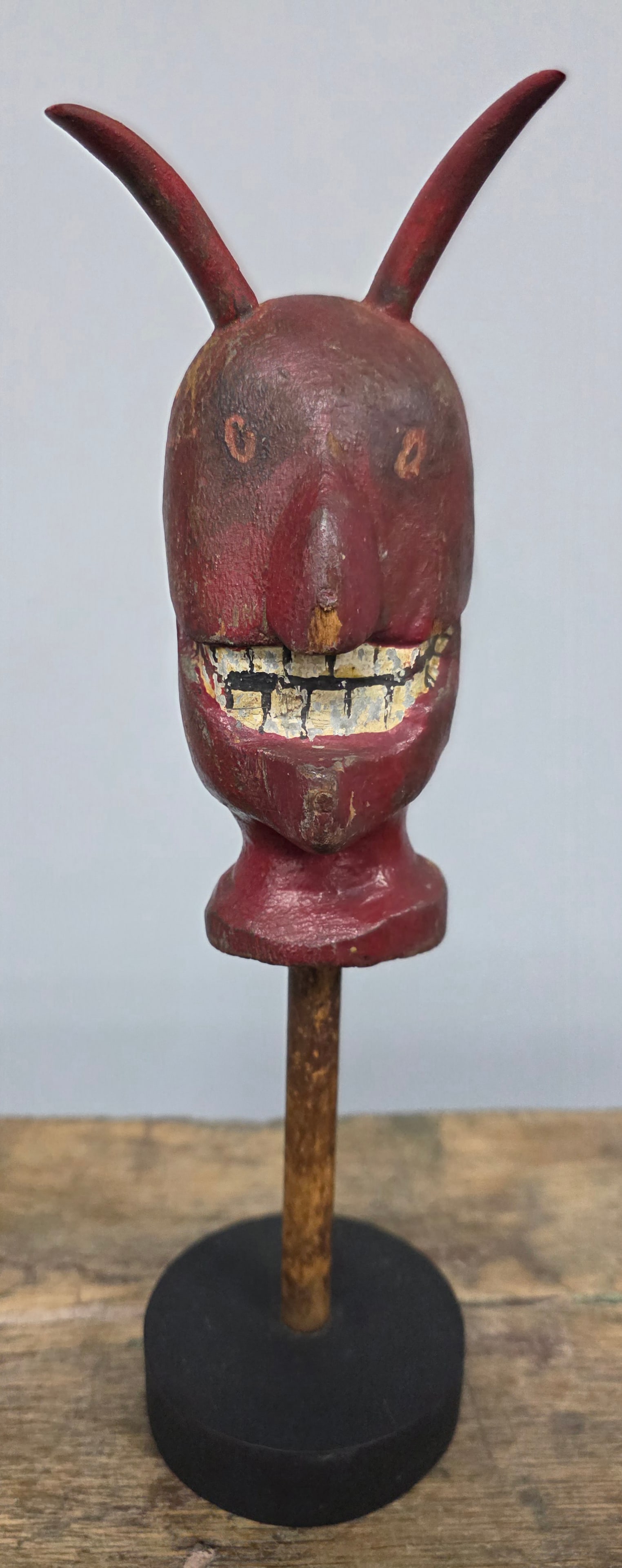 Early American Folk Art Carved Devil Bust on Base: Rare and Early American 1840-1850s Hand Carved Folk Art Devil Bust on Base with origninal red paint and outstaning folky details. Significant collector grade example with no breakage to the horns.