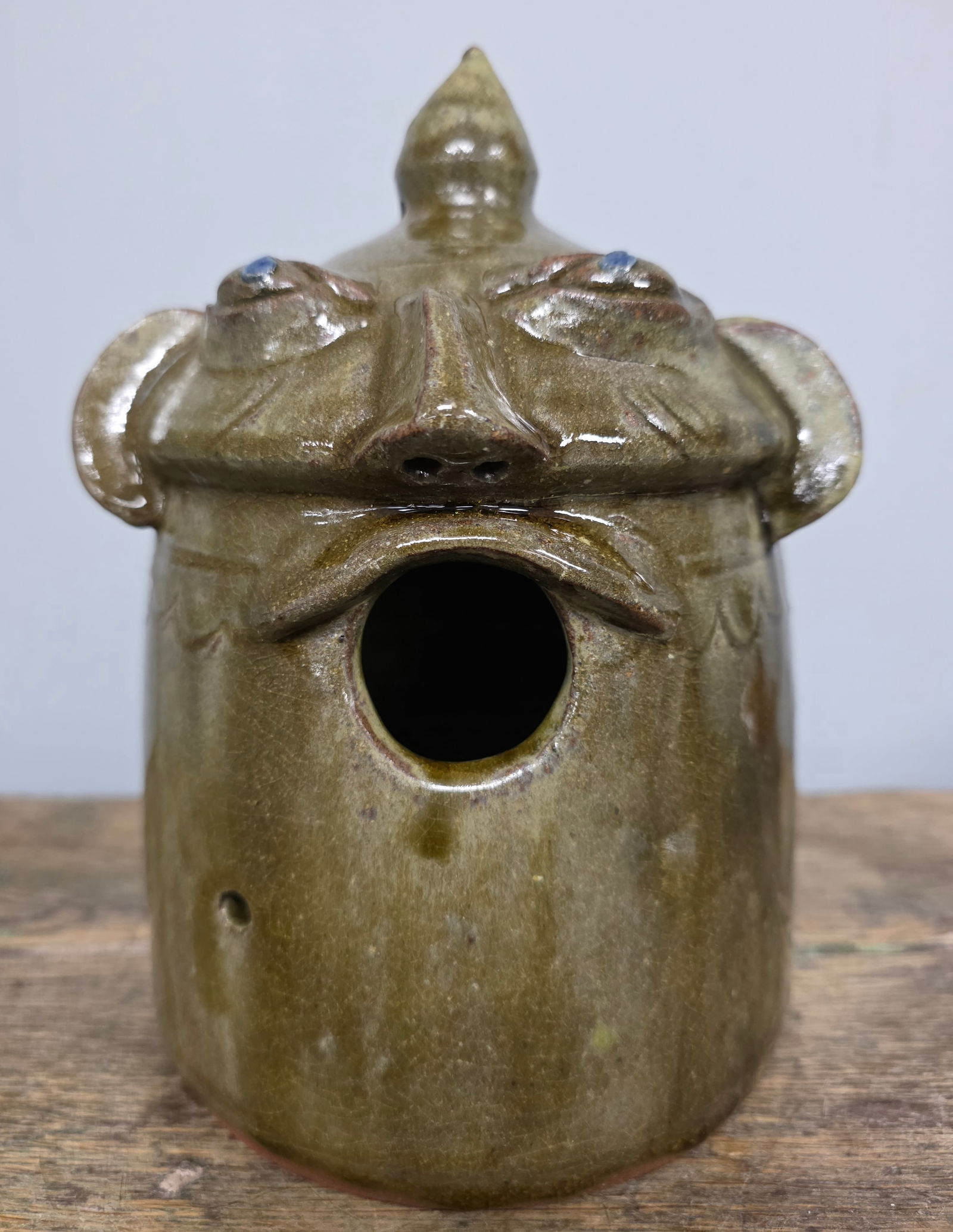 Walter Fleming Folk Pottery Face Birdhouse: Walter Fleming Folk Pottery Face Birdhouse just in time for spring. Collector grade condition with no damage. Standing: 9 3/4" Tall