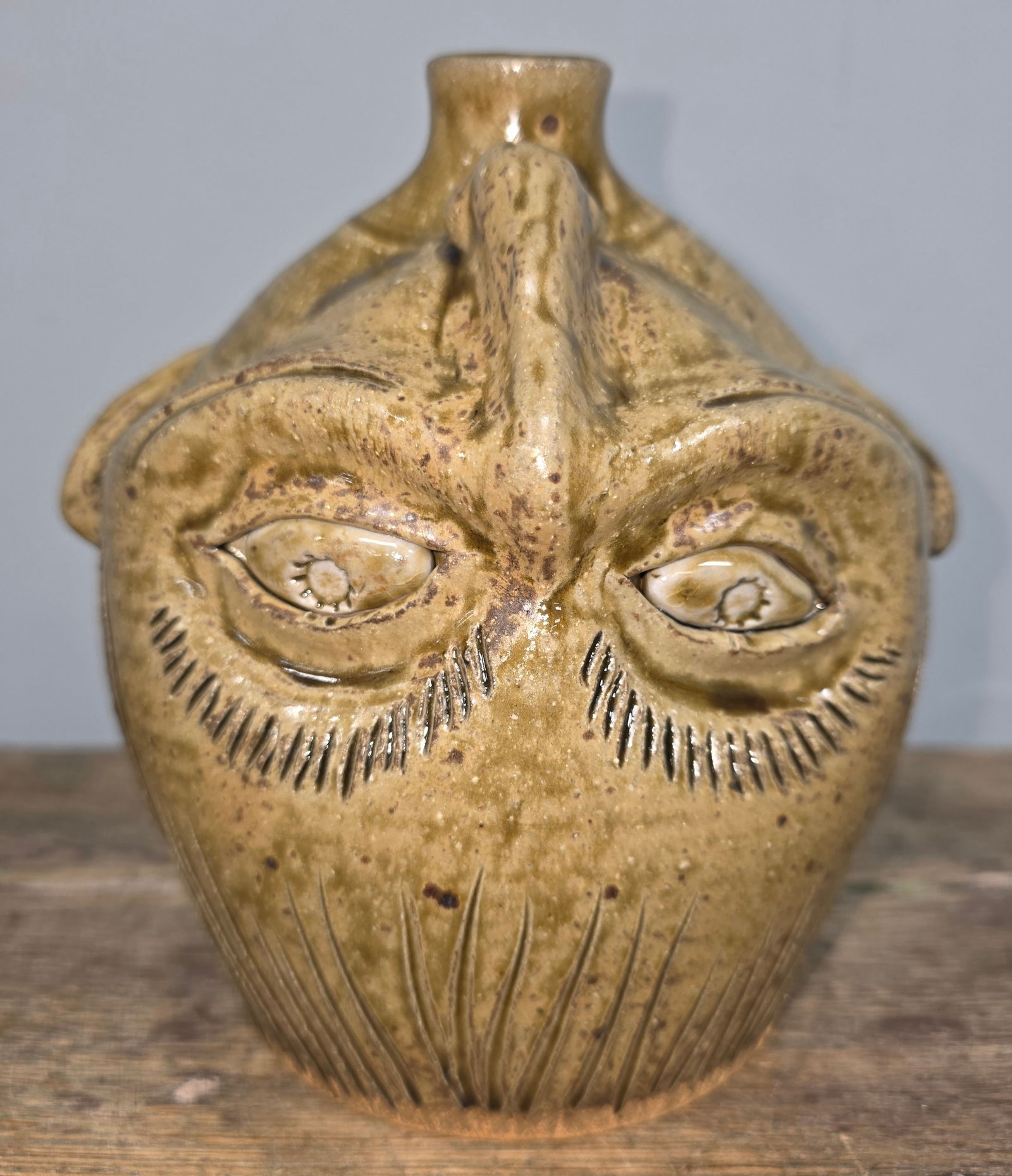 Ottis Norris Upside Down Face Jug: Ottis Norris Upside Down Face Jug in collector grade condition, no damage. Standing: 7 1/4" Tall