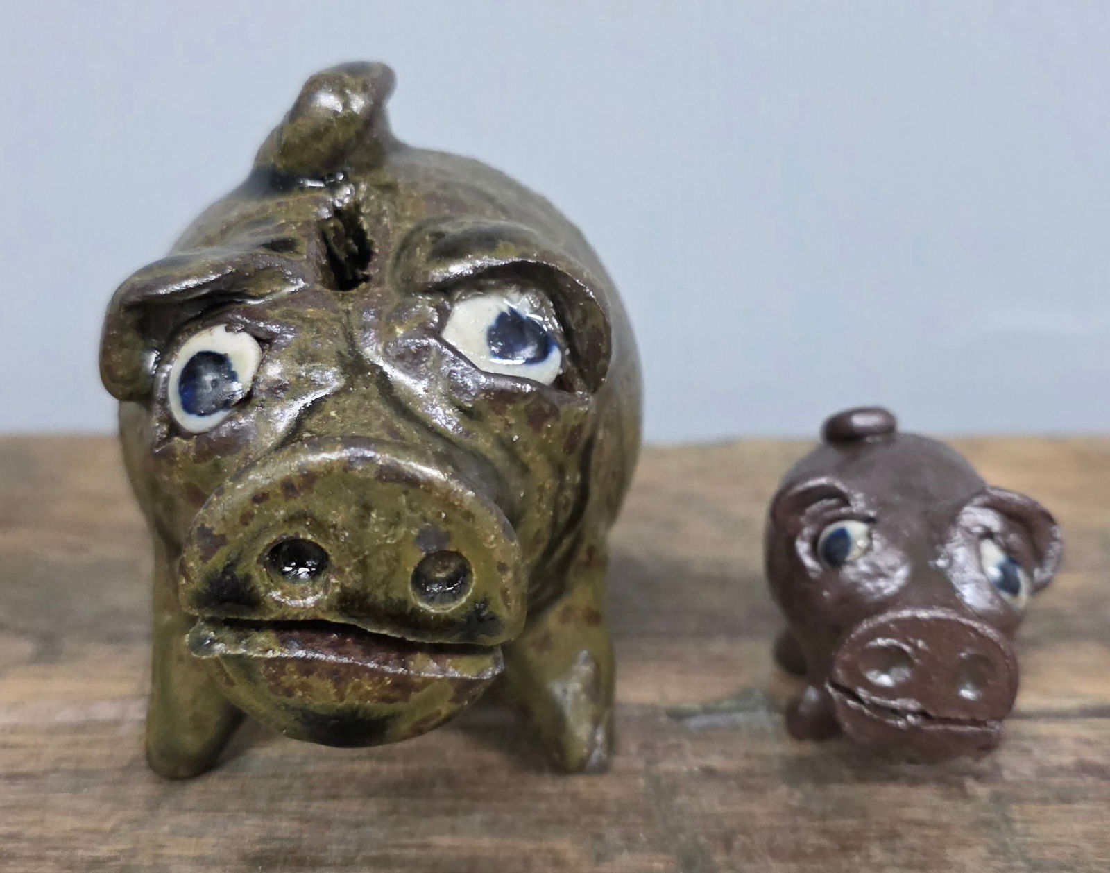 Grace Nell Hewell Folk Art Pig Lot of 2: Grace Nell Hewell Folk Art Pig Lot of 2. Both are in collector grade condition with no crack, chips or repairs. Tallest one standing 3 1/4" tall.