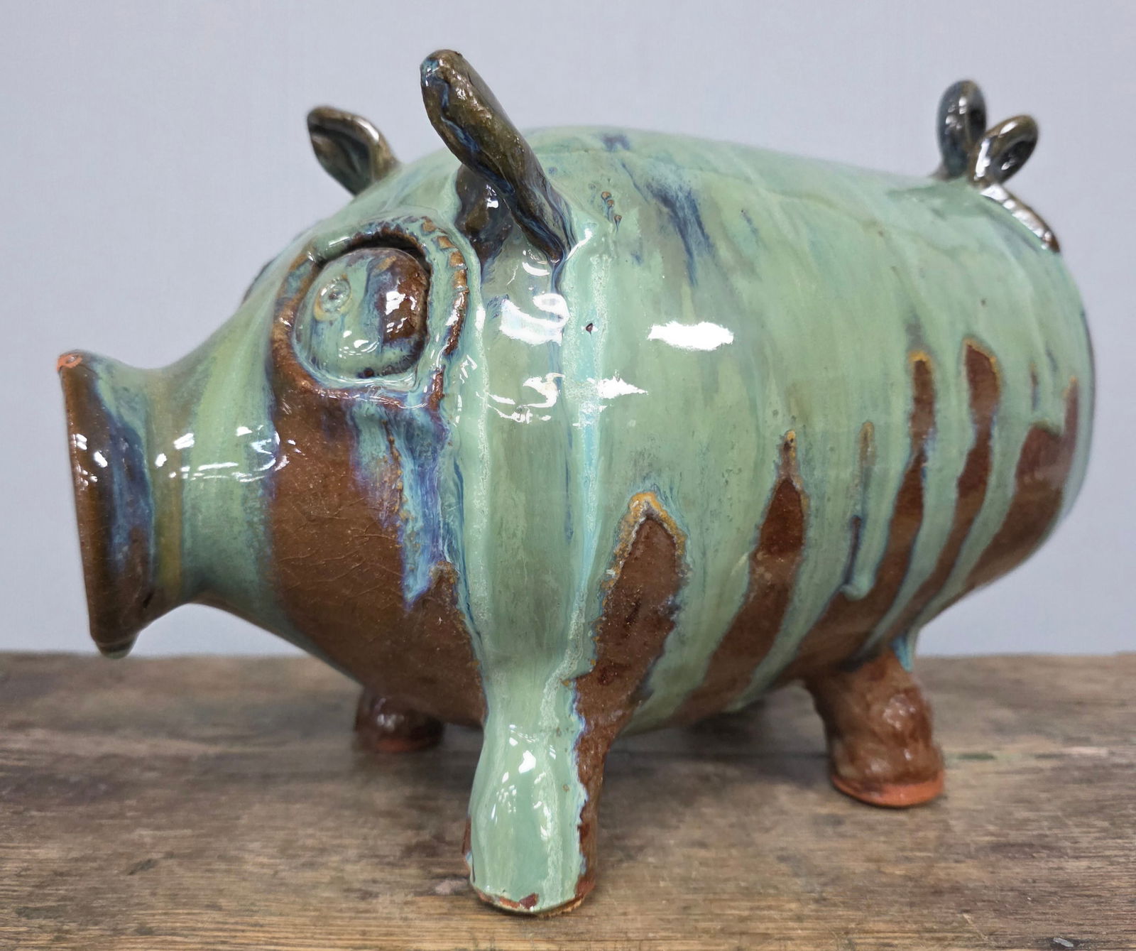 1990s Amado Salamoni Folk Pottery Pig: 1990s Amado Salamoni Folk Pottery Pig. Has some glaze popping from the kiln but no chips, cracks or repairs. Standing 7 3/4" tall x 11" wide.