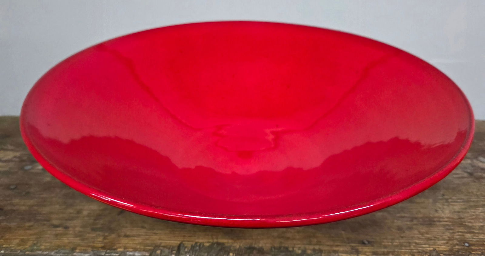 Ben Owen III NC Chinese Red Glaze Bowl: Ben Owen III, Seagrove, North Carolina Chinese Red Glaze Bowl. Stunning fiery red glaze, signed and dated 2001. Titled "Dine Around". Bowl is 14" in diameter.