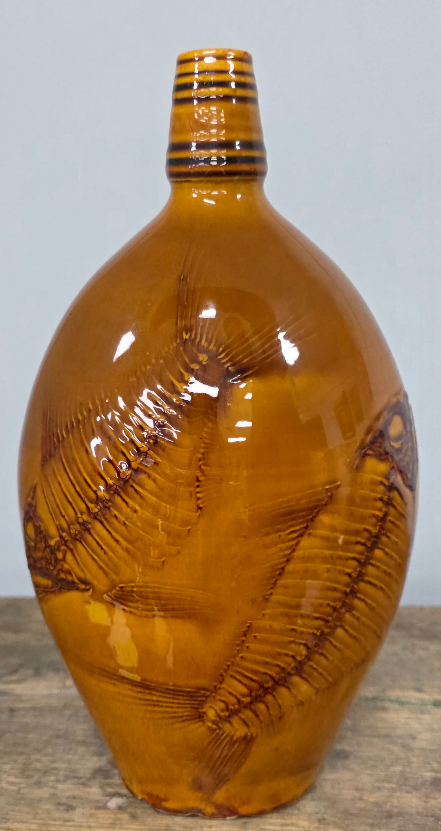 Bulldog Pottery Fish Fossilized Vase: Bulldog Pottery (Seagrove, North Carolina) Fish Fossilized Vase. Standing 11" tall.