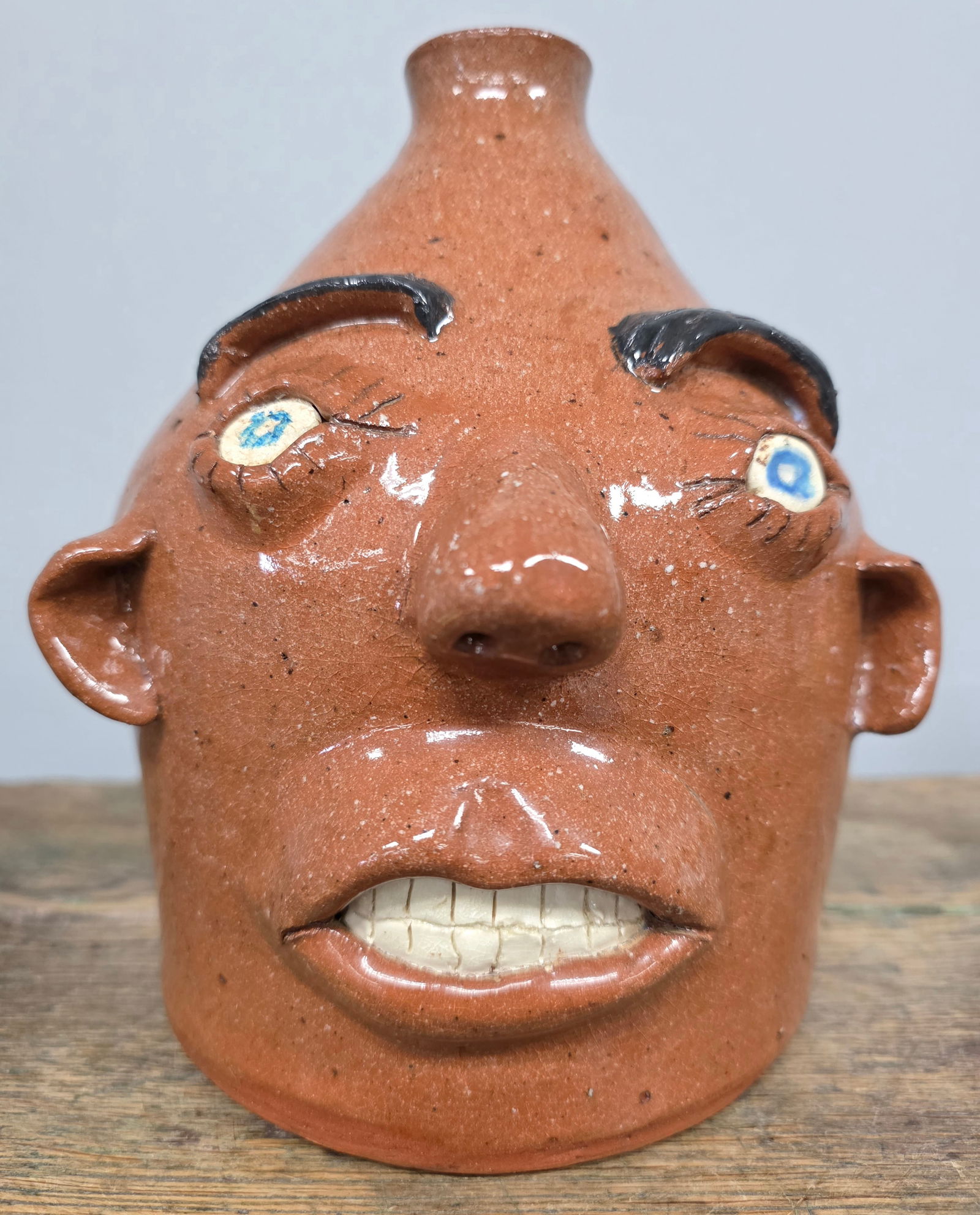 JH Roddy SC Folk Pottery Face Jug: JH Roddy: Greer, South Carolina Folk Pottery Face Jug. Standing 7 3/4" tall.