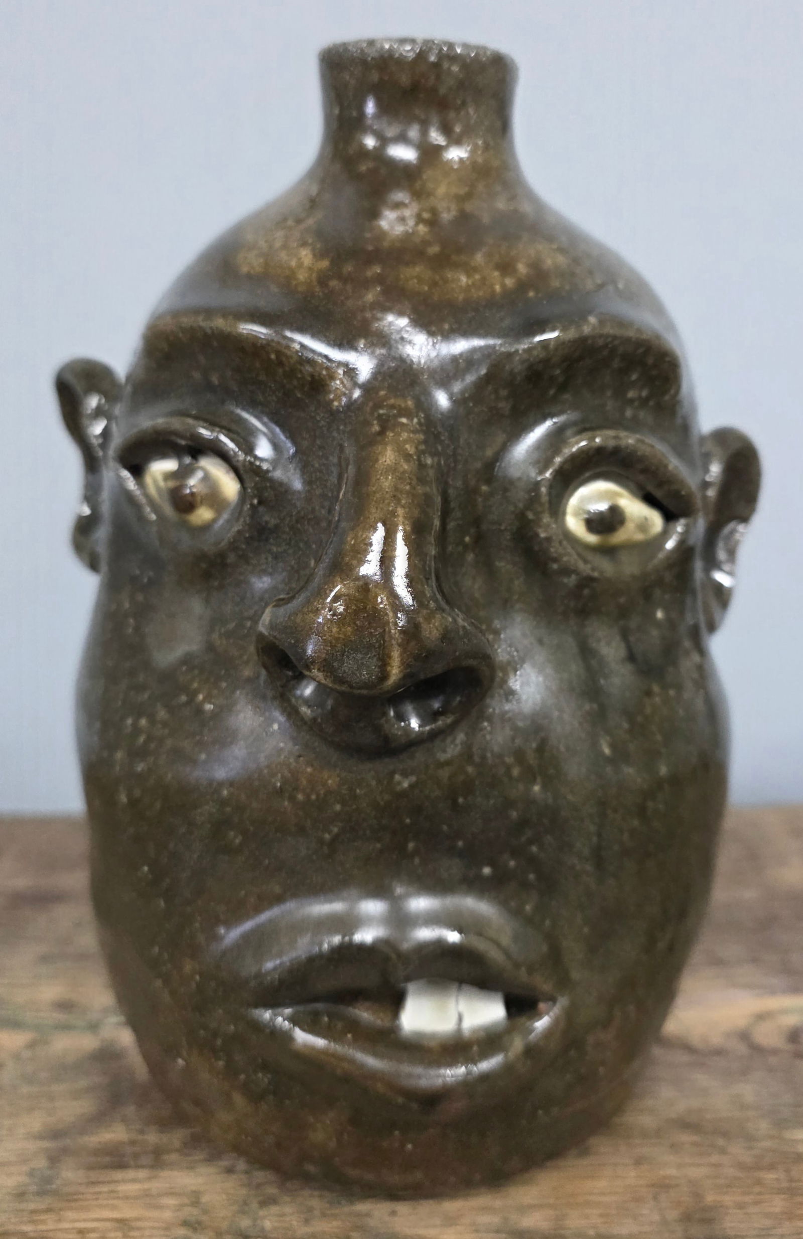 Signed David Meaders Folk Pottery Face Jug: Signed David Meaders Folk Pottery Face Jug with great eye appeal and glaze, with china plate teeth. Standing: 9" Tall