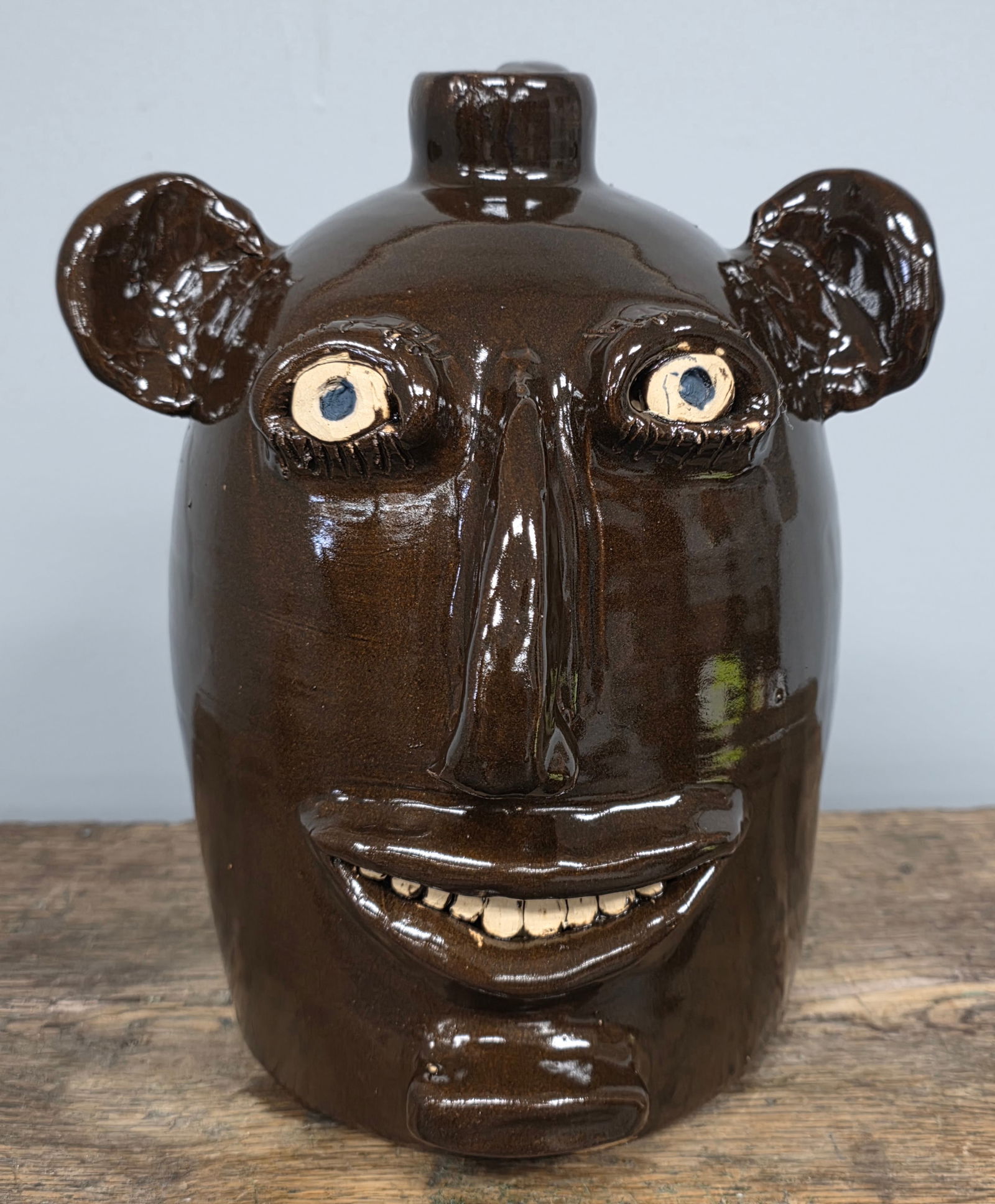 Signed 1985 Jerry Brown Folk Pottery Face Jug: Signed 1985 Jerry Brown Folk Pottery Face Jug in collector grade condition. Standing: 10" Tall