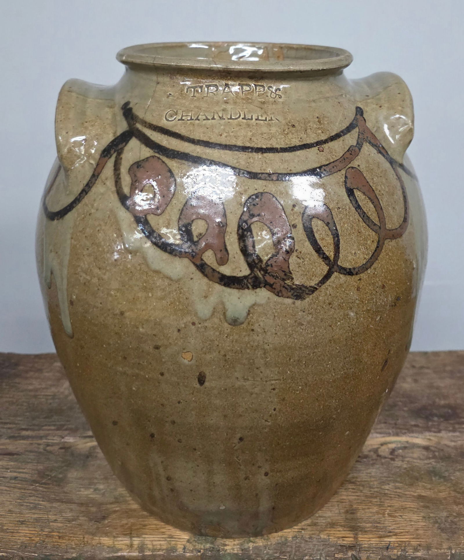 Stunning Edgefield Trapp & Chandler Decorated 2 Gallon Storage Jar: Stunning Edgefield, South Carolina signed Trap & Chandler Decorated Two Gallon Storage Jar with iron slip loop and swag decoration. The size is one of the more sought after examples and very few examp