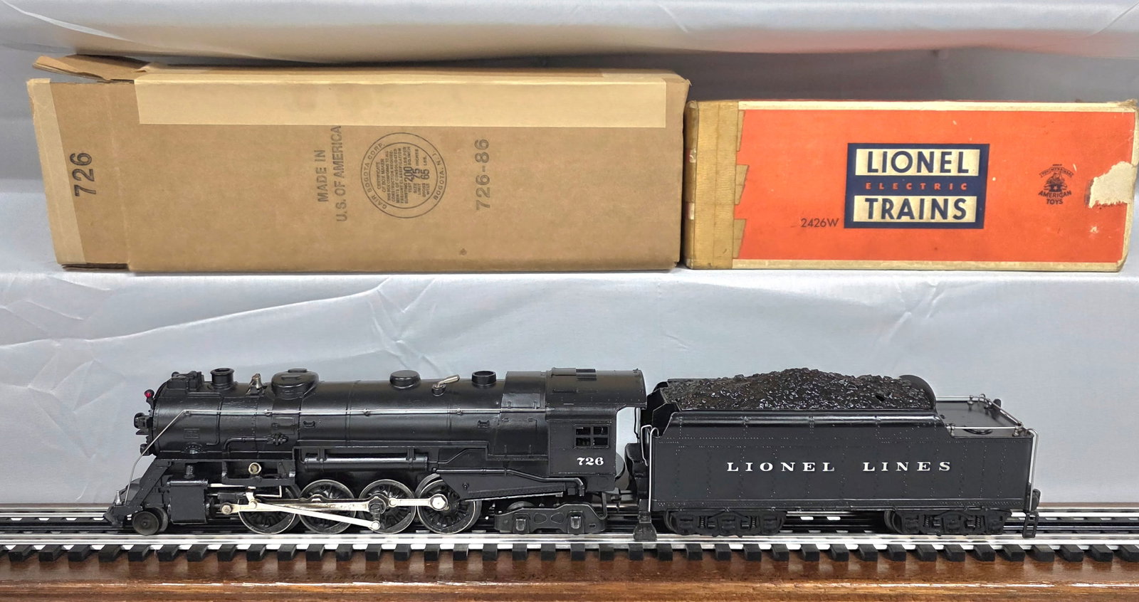Lionel Postwar 773 Hudson Steam Loco & Tender: Lionel Postwar 773 Hudson Steam Locomotive and Tender in tested, fully operational, runs and smokes great. Note this example does not come with the original box but does come with a reproduction box. 