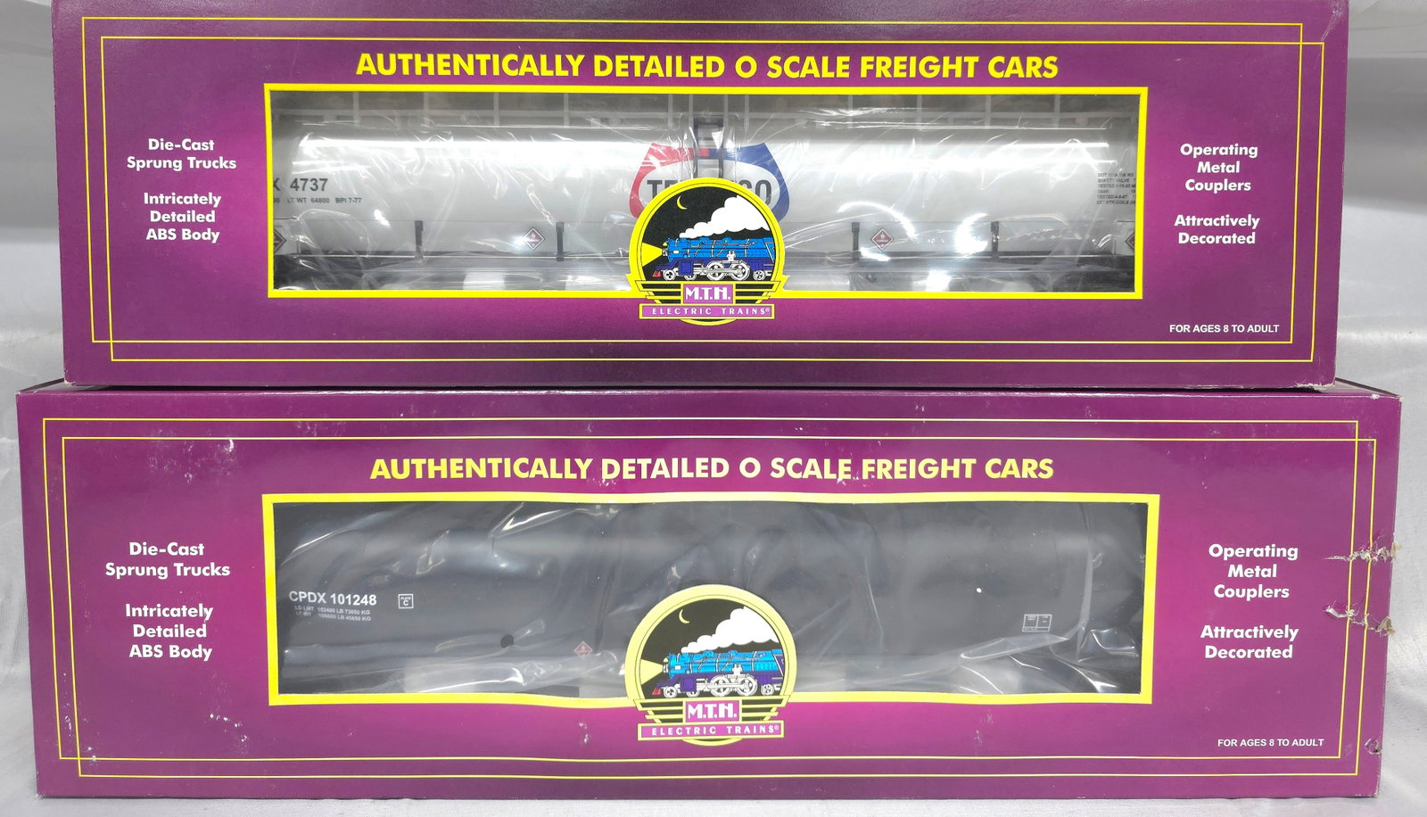 MTH Tank Car Lot of 2 (NIB) C-10: MTH Tank Car Lot of 2 (NIB) C-10 1. 20-96041, Tennaco 20K Gallon Tank Car, C-10. 2. 20-96112, Chevron USA #101248 33K Gallon Tank Car, C-10.