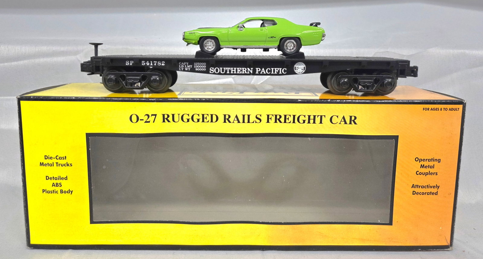 RailKing SP Flat Car with 71 Plymouth GTX (NIB): RailKing 33-7615 Southern Pacific Flat Car with 71 Plymouth GTX (NIB). In C-10 never run condition.