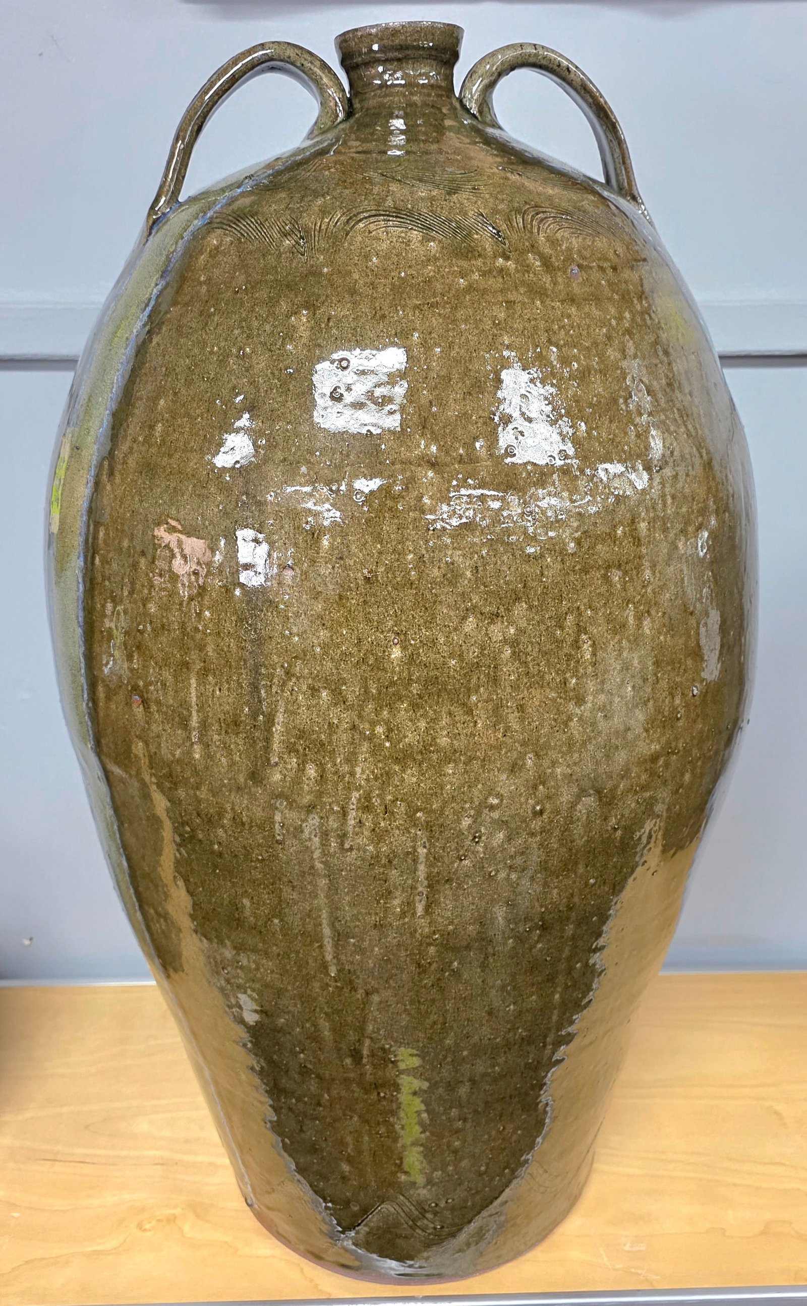 Monumental Ten Gallon Michael Crocker Double Handle Syrup Jug: Truly a Monumental Ten Gallon Michael Crocker Double Handle Syrup Jug with strong glass runs from the handles down towards the base. This is a great example with swag decoration with three rows. This 