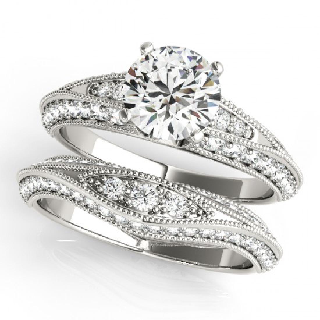 1.51 CTW Certified VS/SI Diamond Solitaire 2Pc Wedding: 31442 - REF-164Y2X ---- 1.51 CTW Certified VS/SI Diamond Solitaire 2Pc Wedding Set Antique Gold ---- Luxury Designer Brand 2 Pc Set Appraised at $8,100 Certificate Number US31442 14k White gold, 2 Pc 