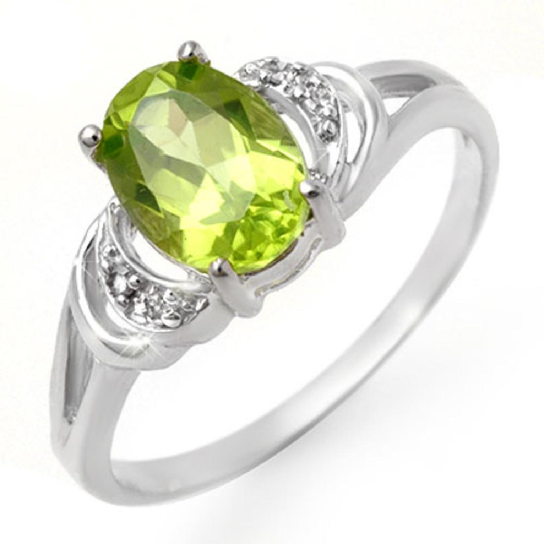 1.55 CTW Peridot & Diamond Ring 10K White Gold: REF-12M9H -13462 ---- 1.55 CTW Peridot & Diamond Ring 10K White Gold ---- Luxury Designer Brand Ring Appraised at $900 Certificate Number US13462 10k White gold, Ring Size is 6, Ring measuring approx.