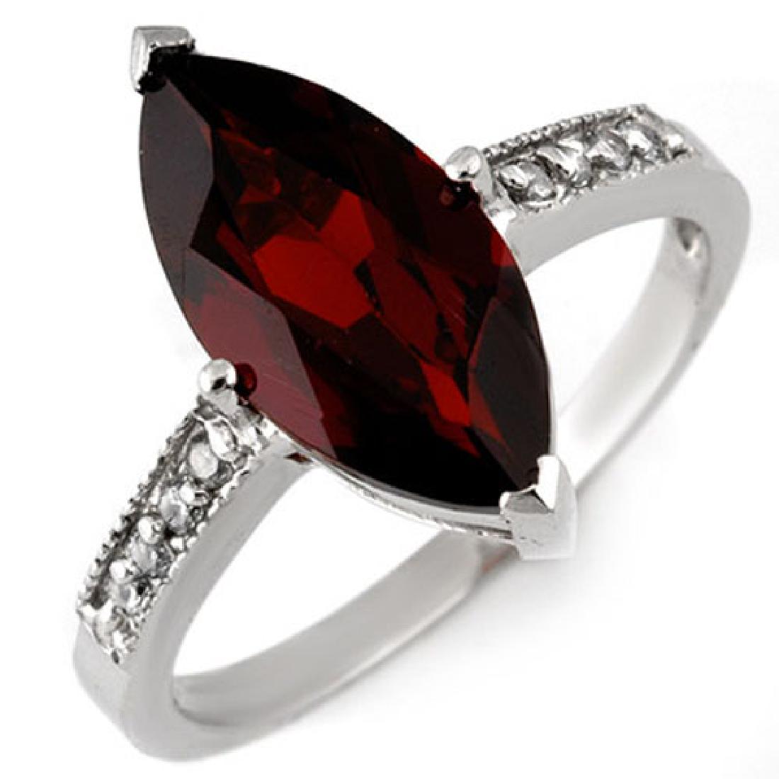 3.10 CTW Garnet & Diamond Ring 10K White Gold: REF-20X4T -11045 ---- 3.10 CTW Garnet & Diamond Ring 10K White Gold ---- Luxury Designer Brand Ring Appraised at $1,250 Certificate Number US11045 10k White gold, Ring Size is 6.5, Ring measuring appr