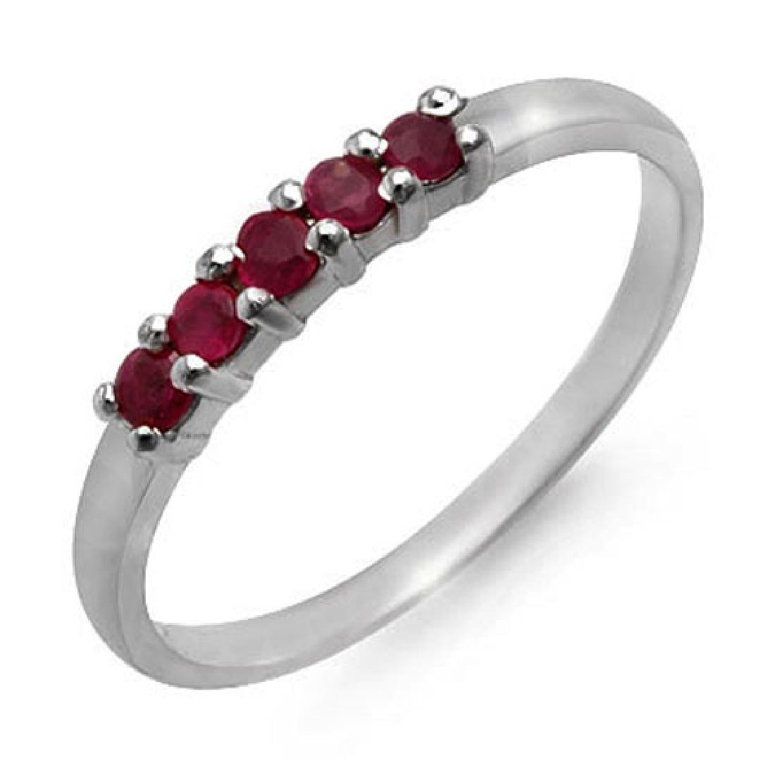 0.25 CTW Ruby Ring 10K White Gold: REF-9Y8K -12635 ---- 0.25 CTW Ruby Ring 10K White Gold ---- Luxury Designer Brand Ring Appraised at $650 Certificate Number US12635 10k White gold, Ring Size is 6.5, Ring measuring approx. 1/8" x 7/16