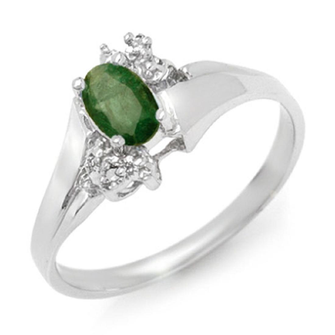 0.62 CTW Emerald & Diamond Ring 10K White Gold: REF-14T9M -13630 ---- 0.62 CTW Emerald & Diamond Ring 10K White Gold ---- Luxury Designer Brand Ring Appraised at $1,000 Certificate Number US13630 10k White gold, Ring Size is 7, Ring measuring appro