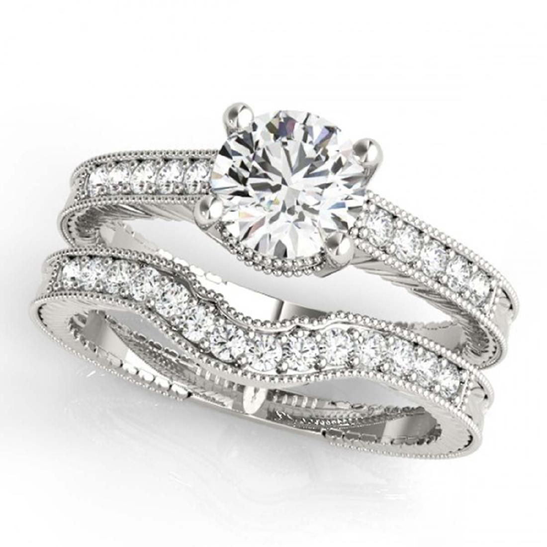 0.88 CTW Certified VS/SI Diamond Solitaire 2Pc Wedding: REF-140T5M -31532 ---- 0.88 CTW Certified VS/SI Diamond Solitaire 2Pc Wedding Set Antique 14K White Gold ---- Luxury Designer Brand 2 Pc Set Appraised at $6,950 Certificate Number US31532 14k White go