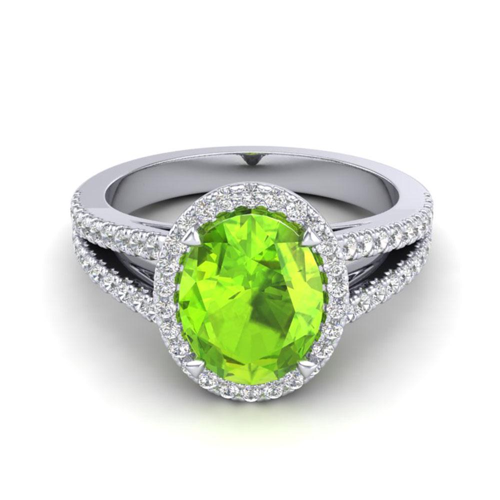 3 ctw Peridot & Micro VS/SI Diamond Halo Solitaire Ring: REF-55K9Y - SKU: 20945 ---- 3 ctw Peridot & Micro VS/SI Diamond Halo Solitaire Ring 18k White Gold Designer Brand Luxury Jewelry, made in the USA Suggested Retail Price: $5,150 Factory offers perfect 