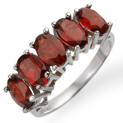Genuine 3.0 ctw Garnet Ring 10K White Gold: Genuine 3.0 ctw Garnet Ring 10K White Gold - Retails for $570 ---- Gemstone: Natural Garnet----Gemstone color: Red----Gemstone quality: Good-to-Very Good----Gemstone Cut & Weight: 5 Oval cut @ 3.0 ctw