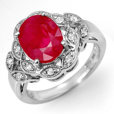 Genuine 3.5 ctw Ruby & Diamond Ring 10K White Gold: Genuine 3.5 ctw Ruby & Diamond Ring 10K White Gold - Retails for $1860 ---- Diamond: 12 Round cut @ 0.25 ctw---- Clarity: SI-I---- Color: H-K----Gemstone: Natural Ruby----Gemstone color: Red----Gemsto