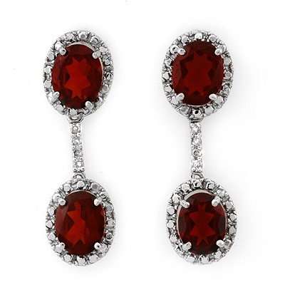 Genuine 8.10 ctw Garnet & Diamond Earrings White Gold: Genuine 8.10 ctw Garnet & Diamond Earrings White Gold - Retails for $1180 ---- Diamond: 8 Round cut @ 0.10 ctw---- Clarity: SI-I---- Color: H-K----Gemstone: Natural Garnet----Gemstone color: Red----Ge