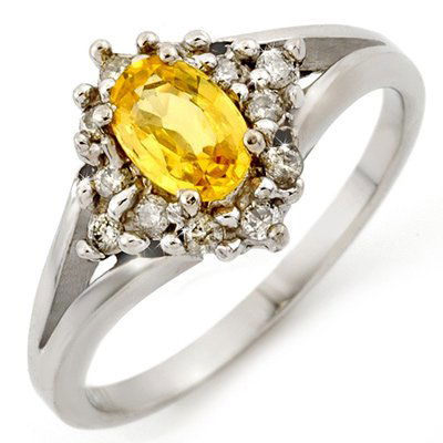 Genuine 0.95ctw Yellow Sapphire & Diamond Ring 10K Gold: Genuine 0.95ctw Yellow Sapphire & Diamond Ring 10K Gold - Retails for $1050 ---- Diamond: 12 Round cut @ 0.30 ctw---- Clarity: SI-I---- Color: H-K----Gemstone: Natural Sapphire----Gemstone color: Yell