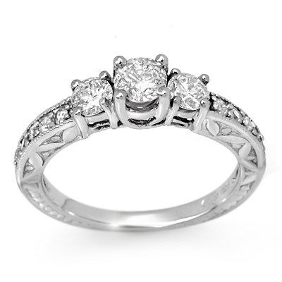 Natural 0.95 ctw Diamond Ring 10K White Gold: Natural 0.95 ctw Diamond Ring 10K White Gold - Retails for $3450 ---- Diamond: 13 Round cut @ 0.95 ctw---- Clarity: SI-I---- Color: H-K----Metal Purity & Color : 10K Gold-White----Gold weight: 3.55 gr