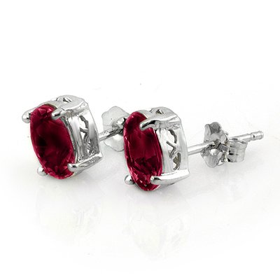 Genuine 1.50 ctw Ruby Stud Earrings 14K White Gold: Genuine 1.50 ctw Ruby Stud Earrings 14K White Gold - Retails for $650 ---- Gemstone: Natural Ruby----Gemstone color: Red----Gemstone quality: Good-to-Very Good----Gemstone Cut & Weight: 2 Oval cut @ 1
