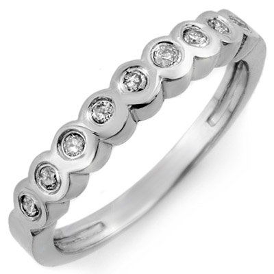 Natural 0.33 ctw Diamond Ring 10K White Gold: Natural 0.33 ctw Diamond Ring 10K White Gold - Retails for $1010 ---- Diamond: 9 Round cut @ 0.33 ctw---- Clarity: SI-I---- Color: H-K----Metal Purity & Color : 10K Gold-White----Gold weight: 2.90 gra