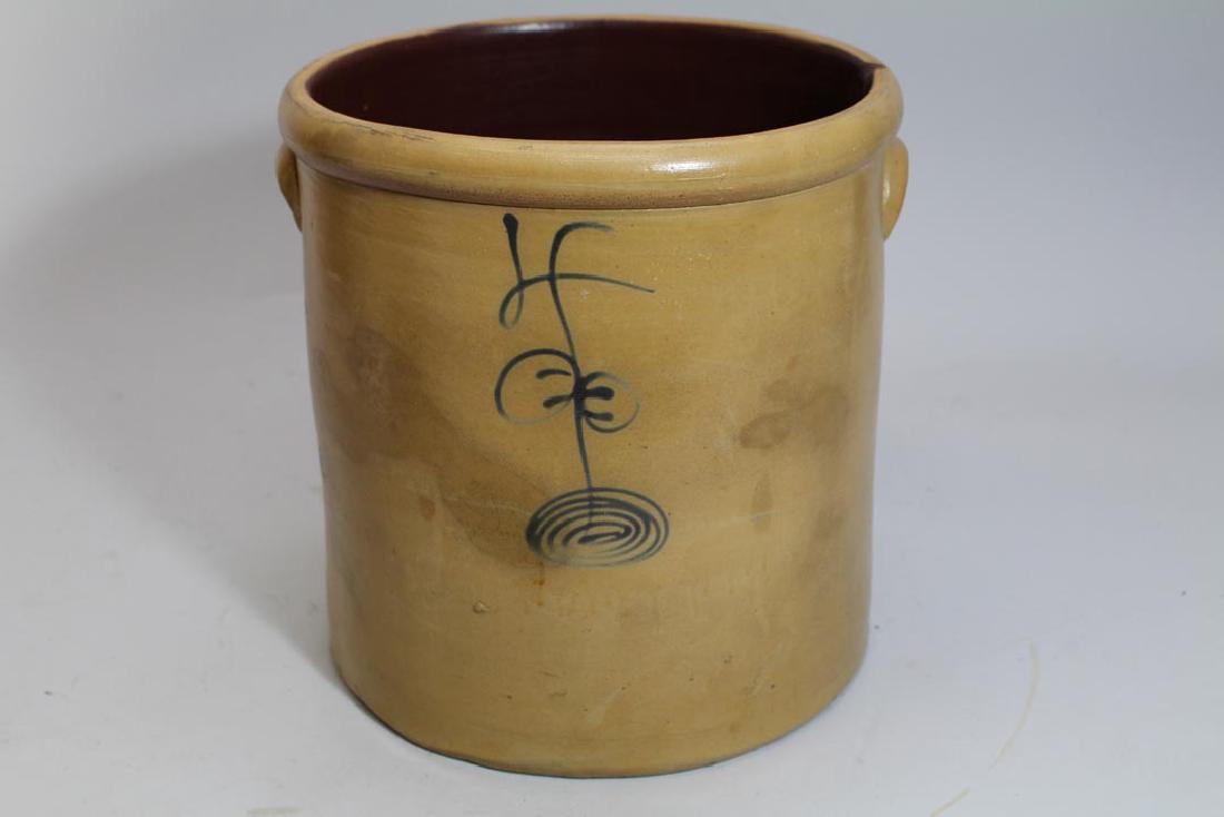 Red Wing 4 Gallon Salt Glaze Crock: Cobalt number 4 over double "P" mark. Applied handles. Two inside rim chips. Reddish brown interior is not glazed. 11 1/2" diameter x 11 3/4" high.