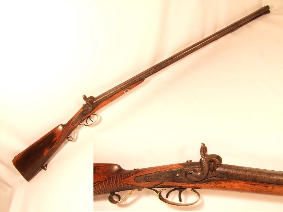 1860s Double Barrel Cap And Ball Shotgun: Engraved trigger guard, lock plate and hammers. Replaced screws. No Makers Mark found. 46 1/2".
