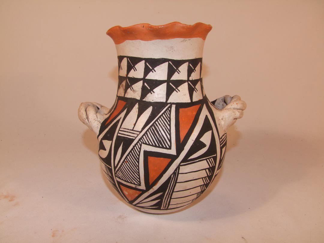 Early 1900s Acoma Pueblo Decorated Handmade Pot : This ruffled top jar has geometric designs with applied twisted handles. 8 1/2' X 9 1/2" high. Repaired chip on the top can be seen in the second photo.