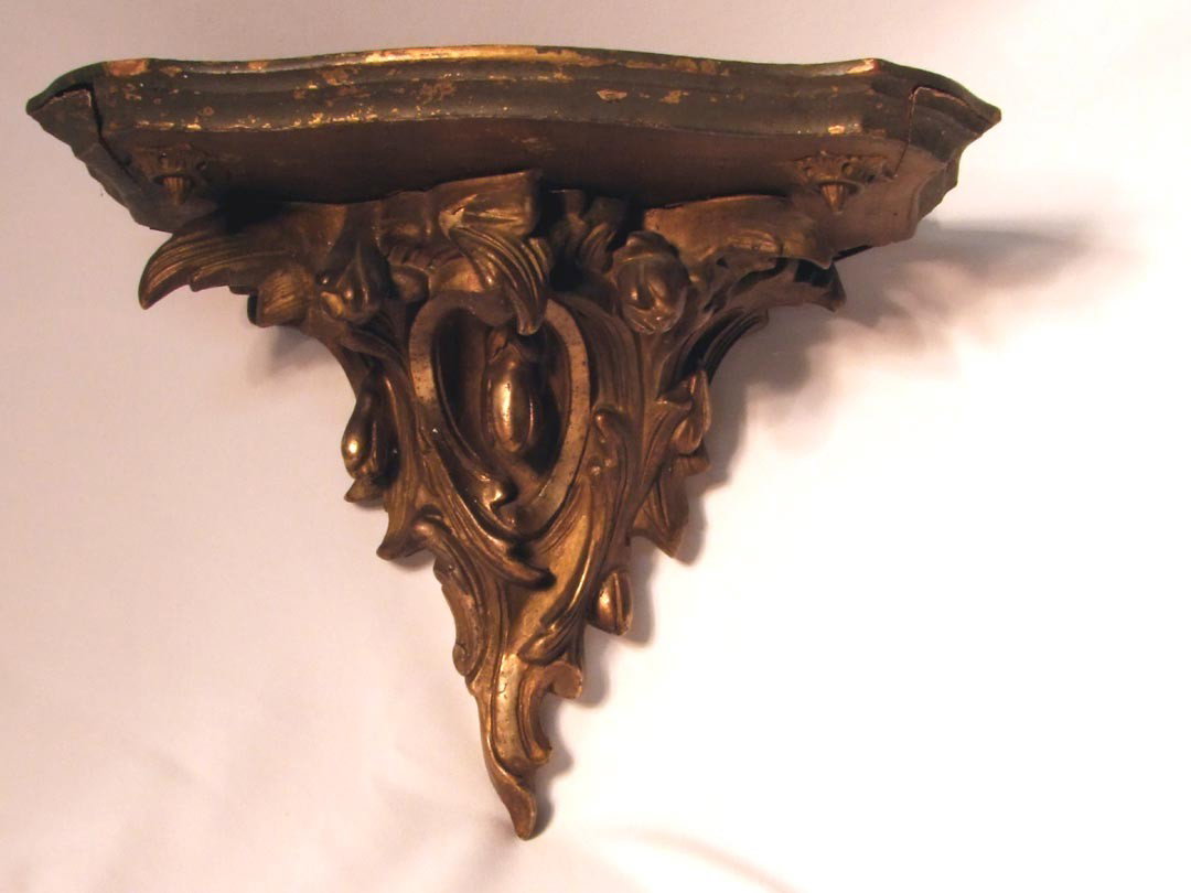 Early 1800s European Wood And Gesso Bracket: The back corners have been cut and shaped and fitted with brackets so that this shelf can hang in a corner. 15" x 9" x 11 1/4" high.